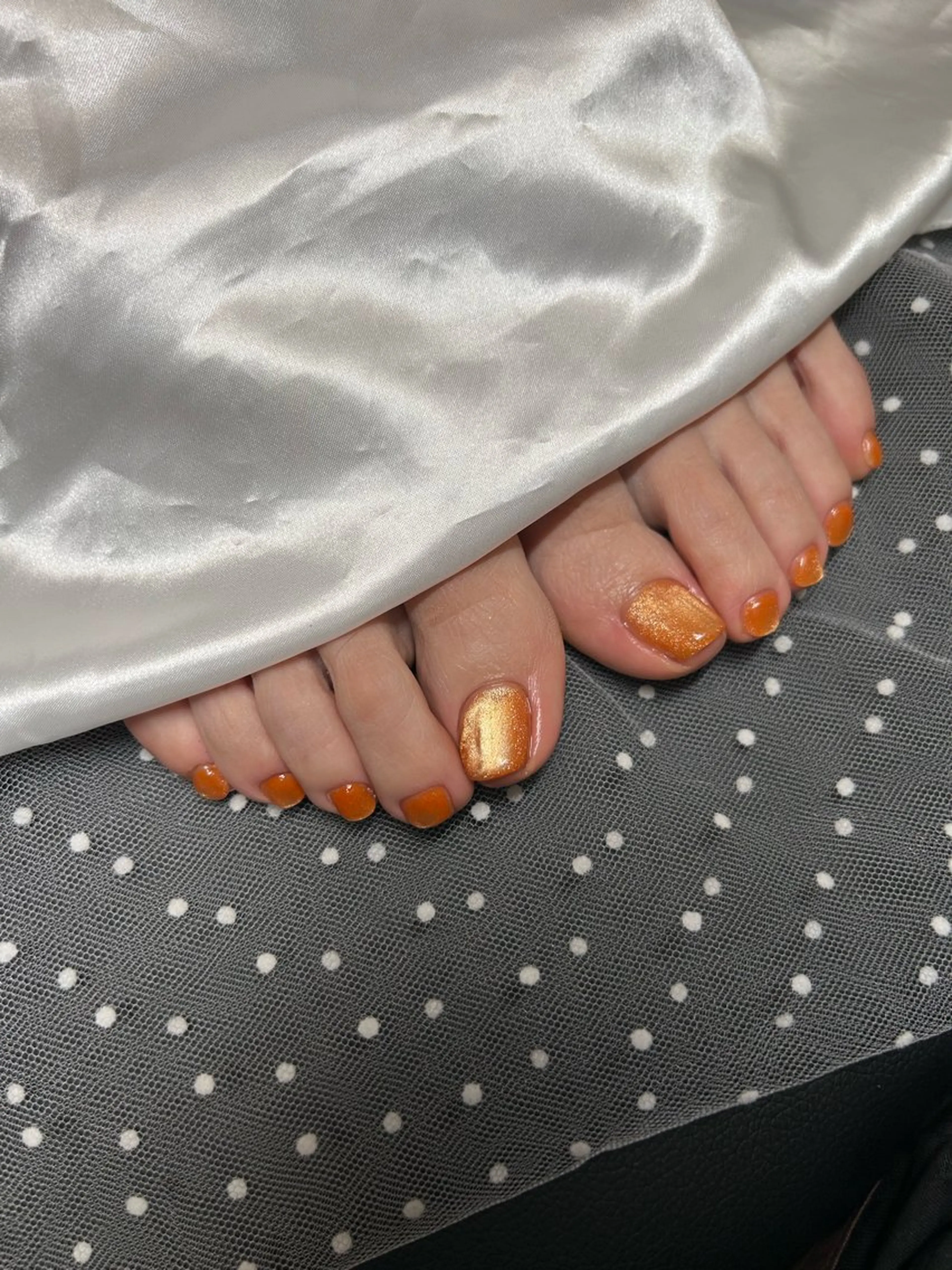 ネイル オレンジ フットネイル Bell Nailのネイルデザイン