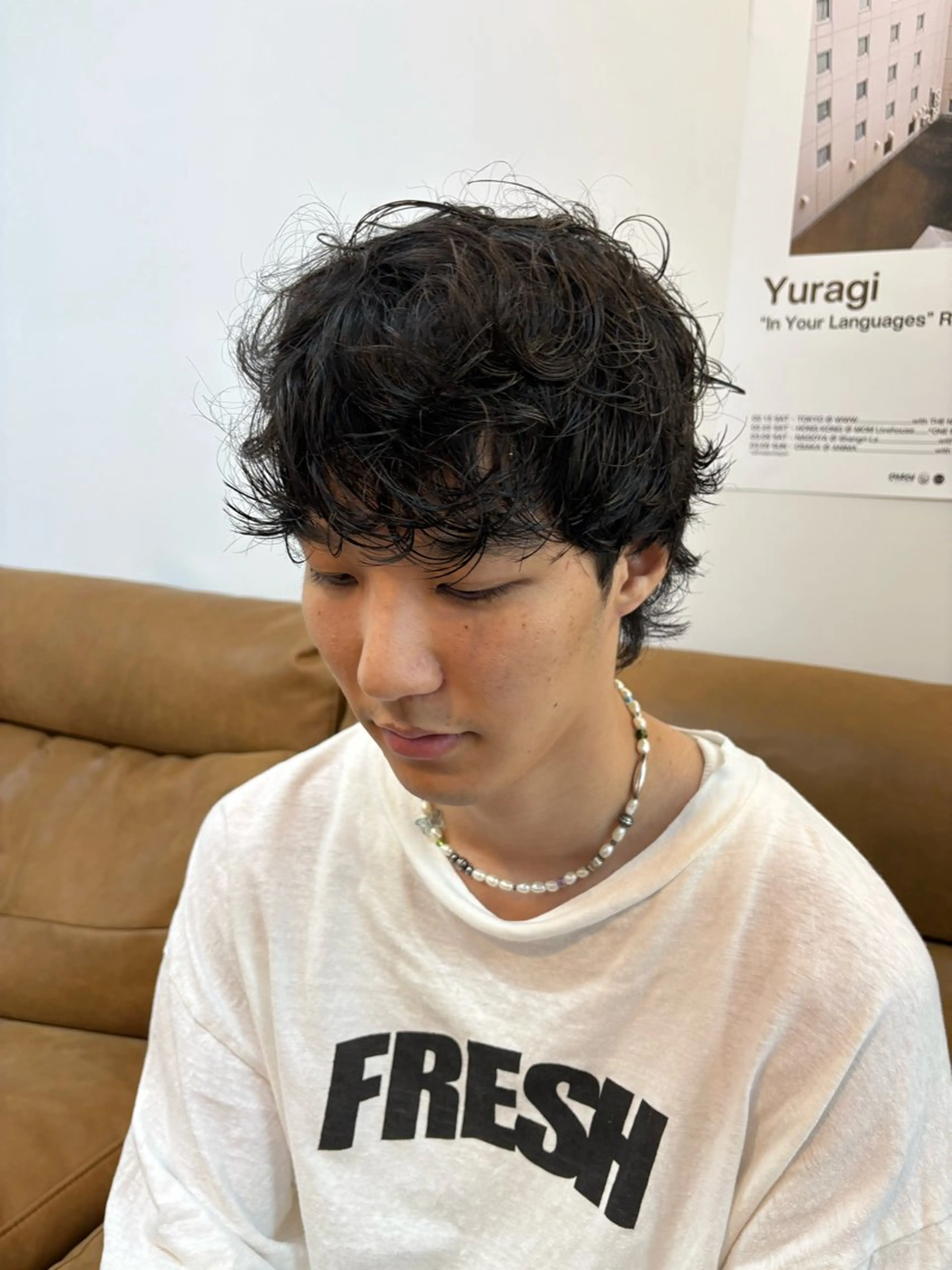 【ウルフパーマ】動きと立体感のあるスタイル　顔周りにレイヤーを入れて軽さを演出。パーマで動きを出し、トレンド感UP。の写真