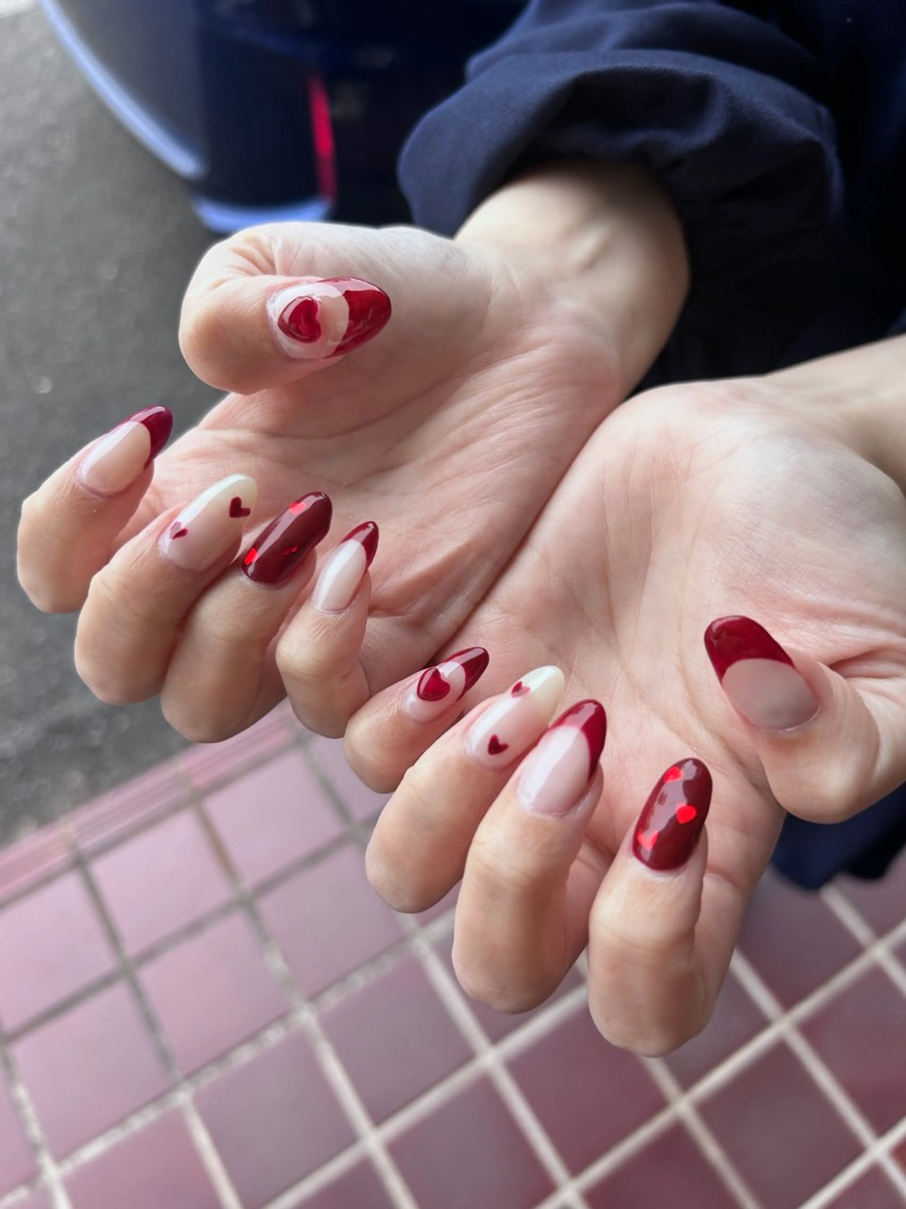 フリーデザインネイル🩵🧡の写真