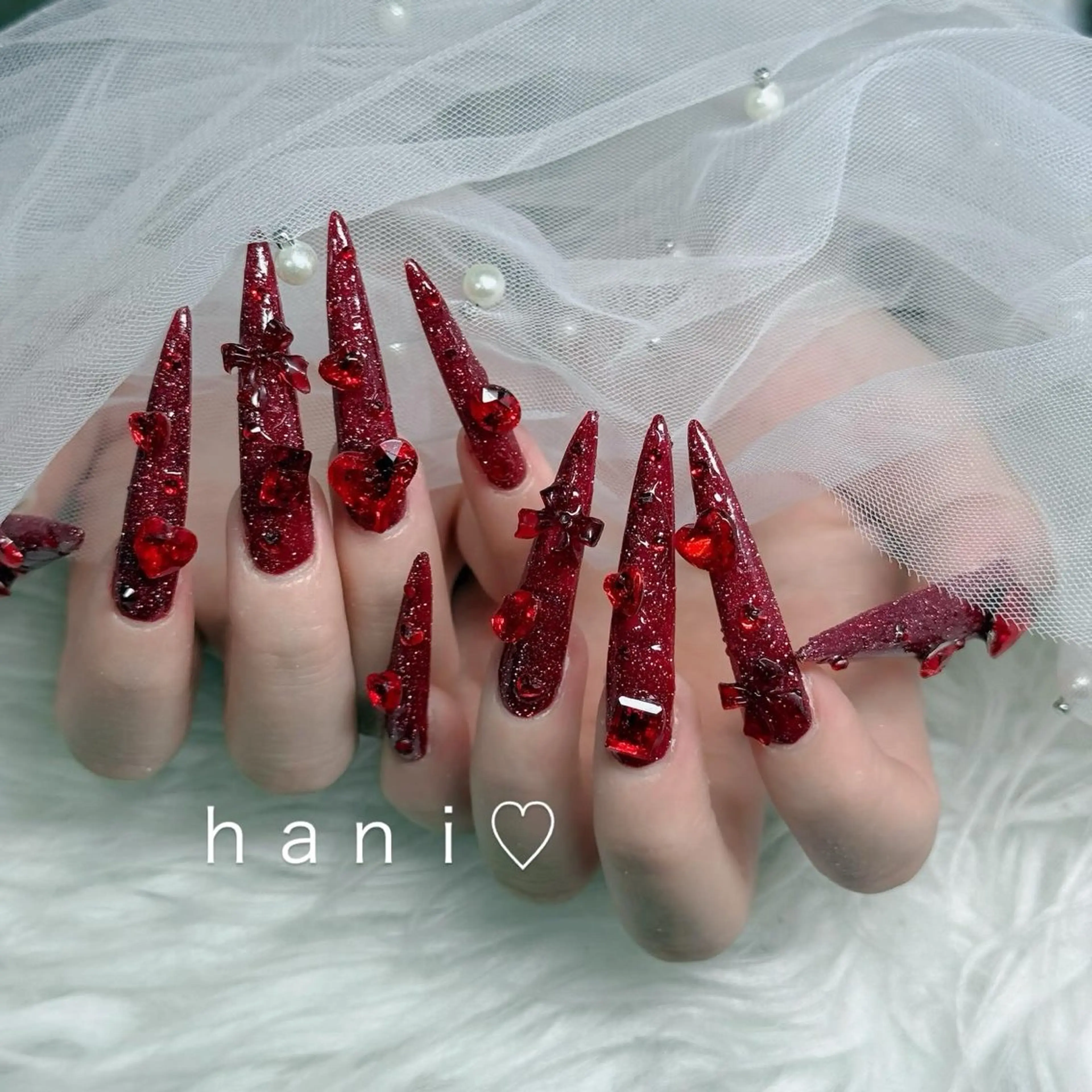 ネイル 成人式 ロングネイル マグネットネイル 大理石ネイル(マーブル) リボン ハンドネイル Hani Nail Salonのネイルデザイン