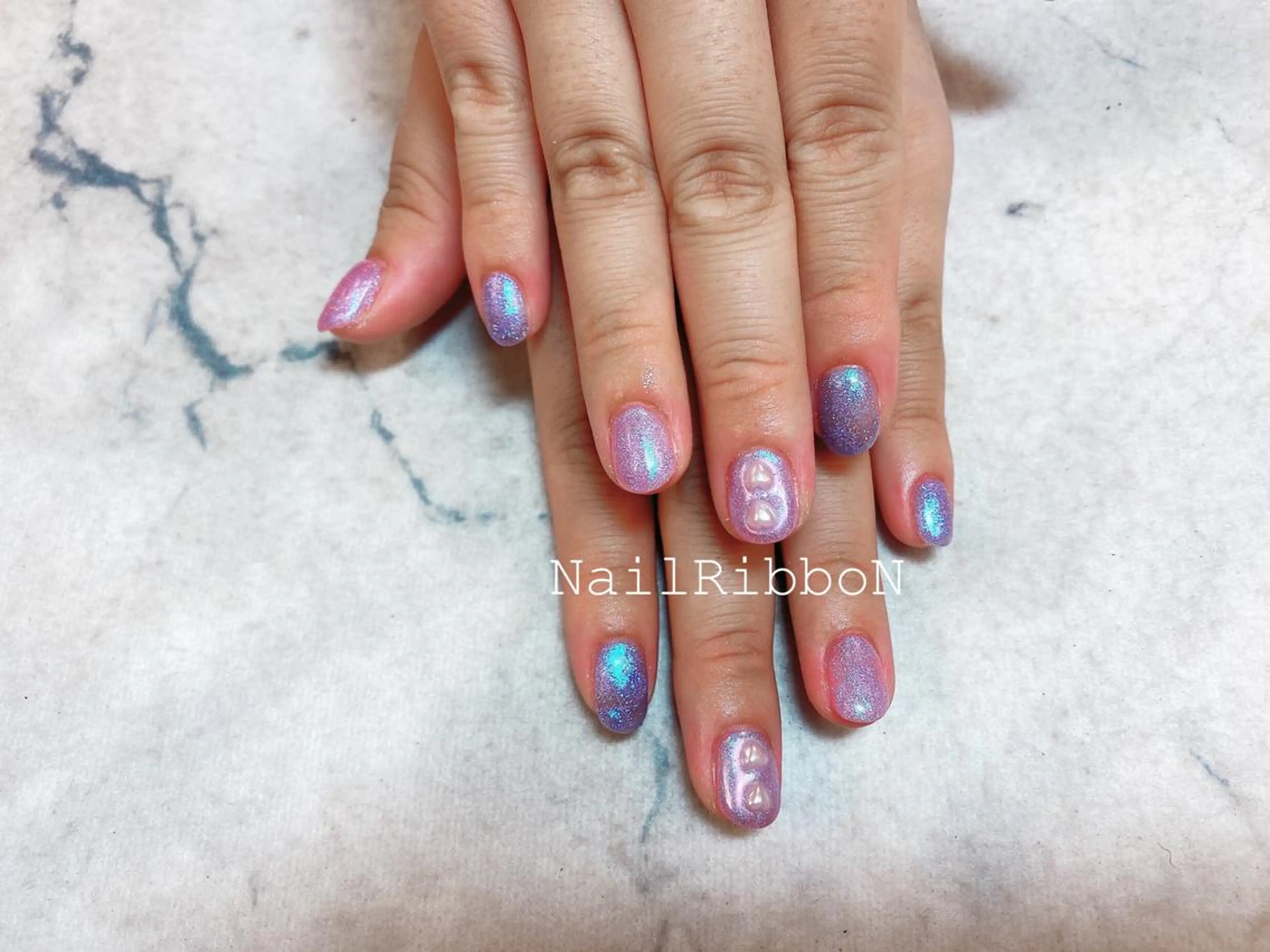 ネイル ネイルリボン 受付スタッフのネイルデザイン