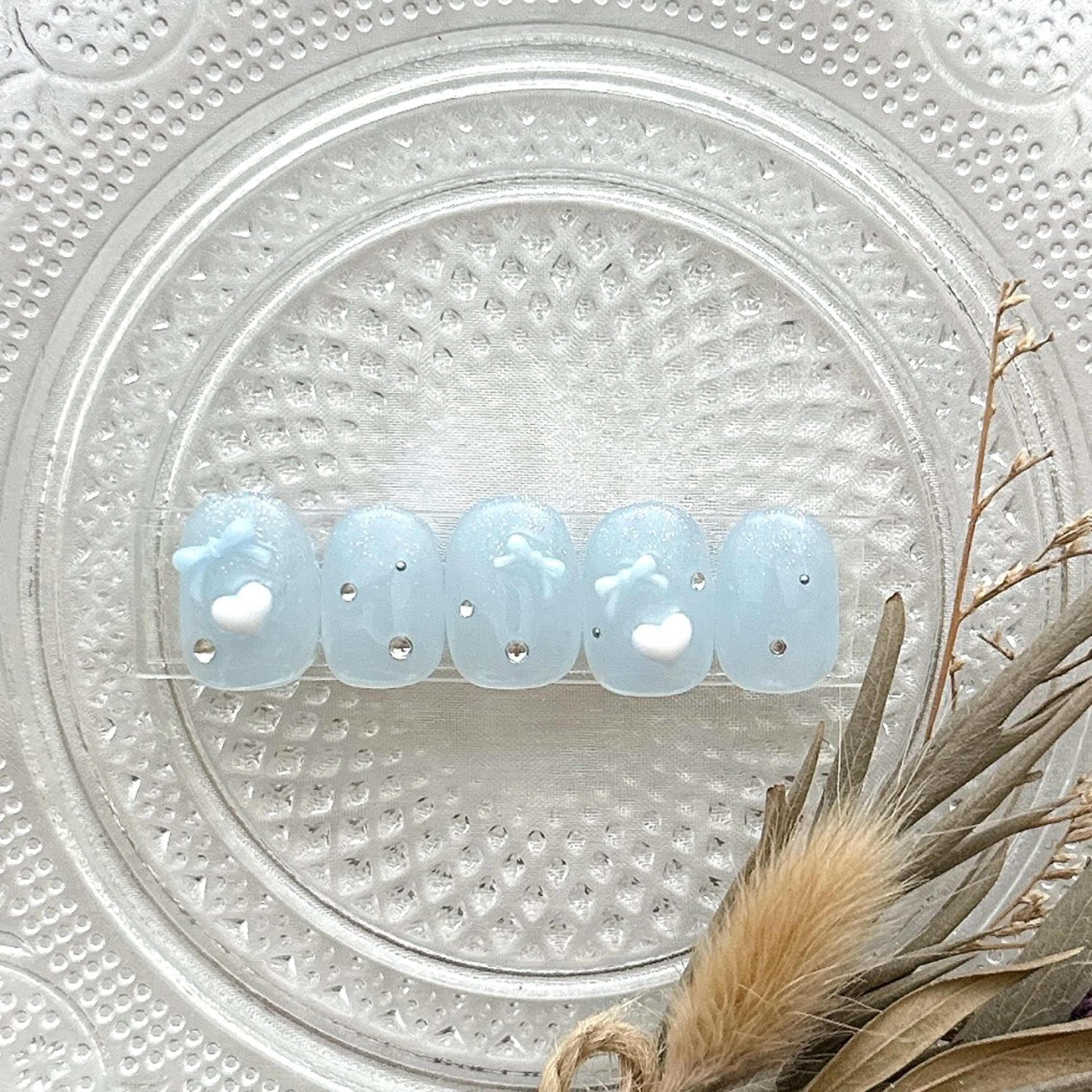 ネイル ハート ラメ(グリッター) ラメグラデーション 水色 リボン ハンドネイル peaberry nailのネイルデザイン