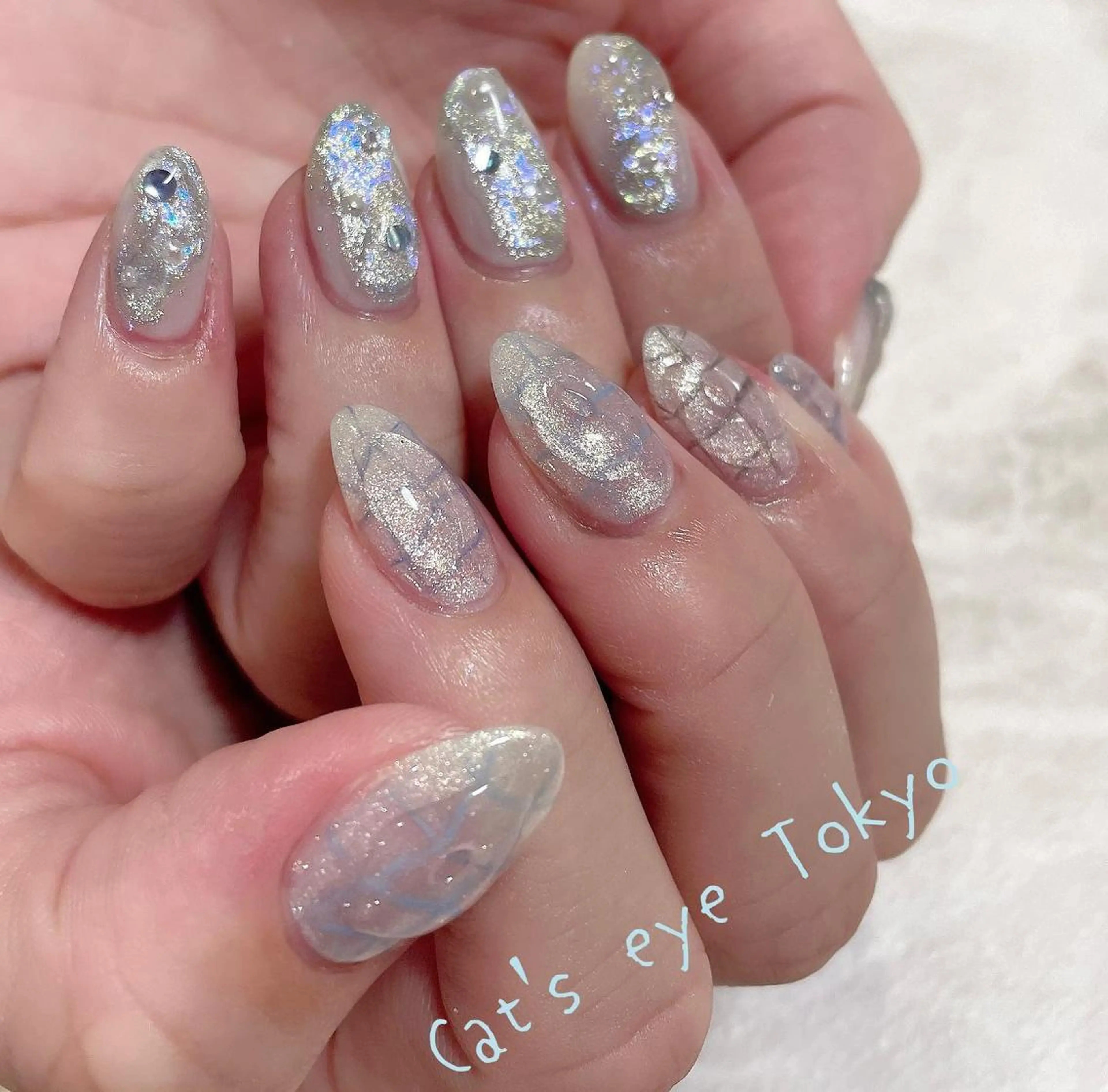 ネイル マツエク・マツパ 夏ネイル Cat's eye TOKYO 新宿店のネイルデザイン