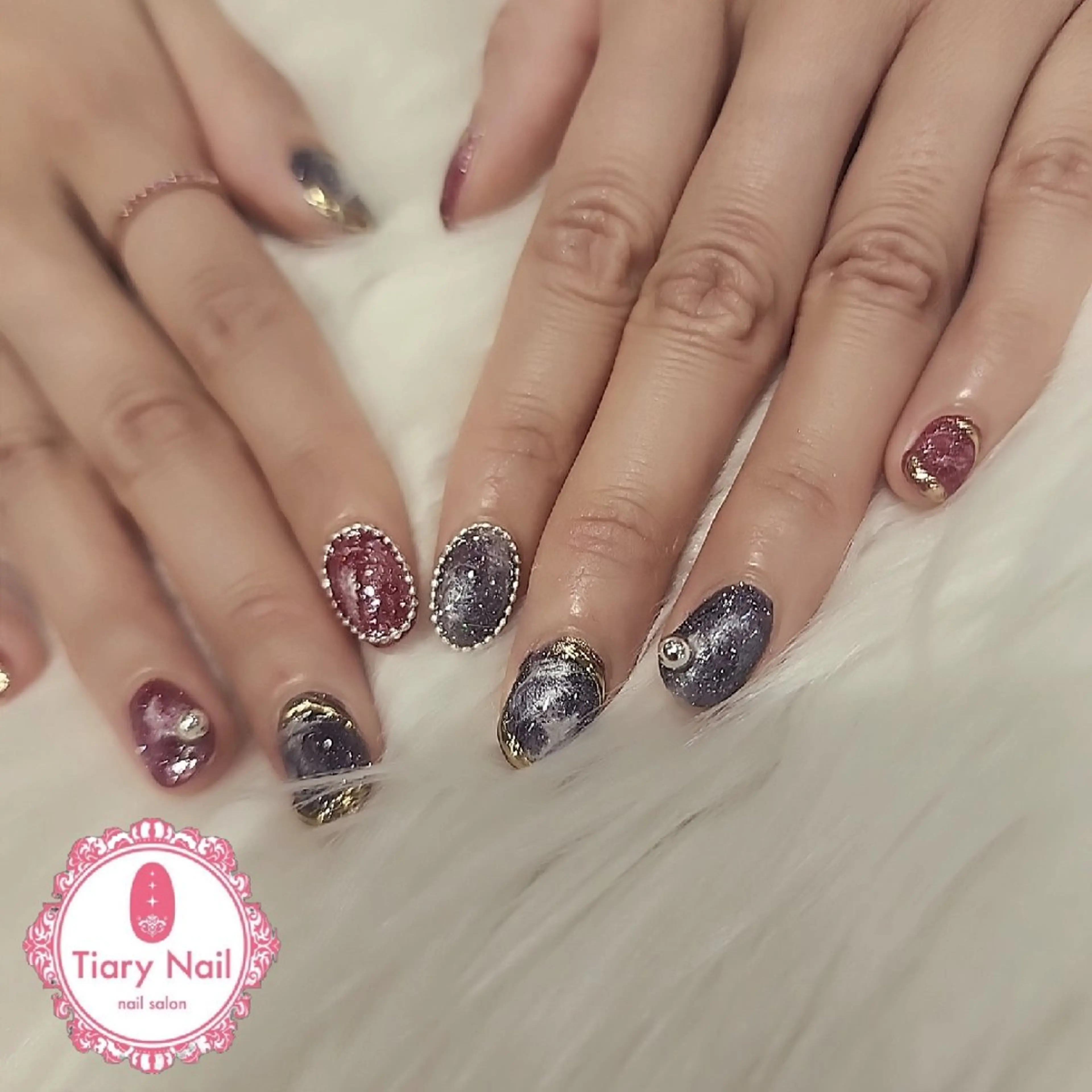 ネイル 💙🤍Tiary M🤍💙のネイルデザイン