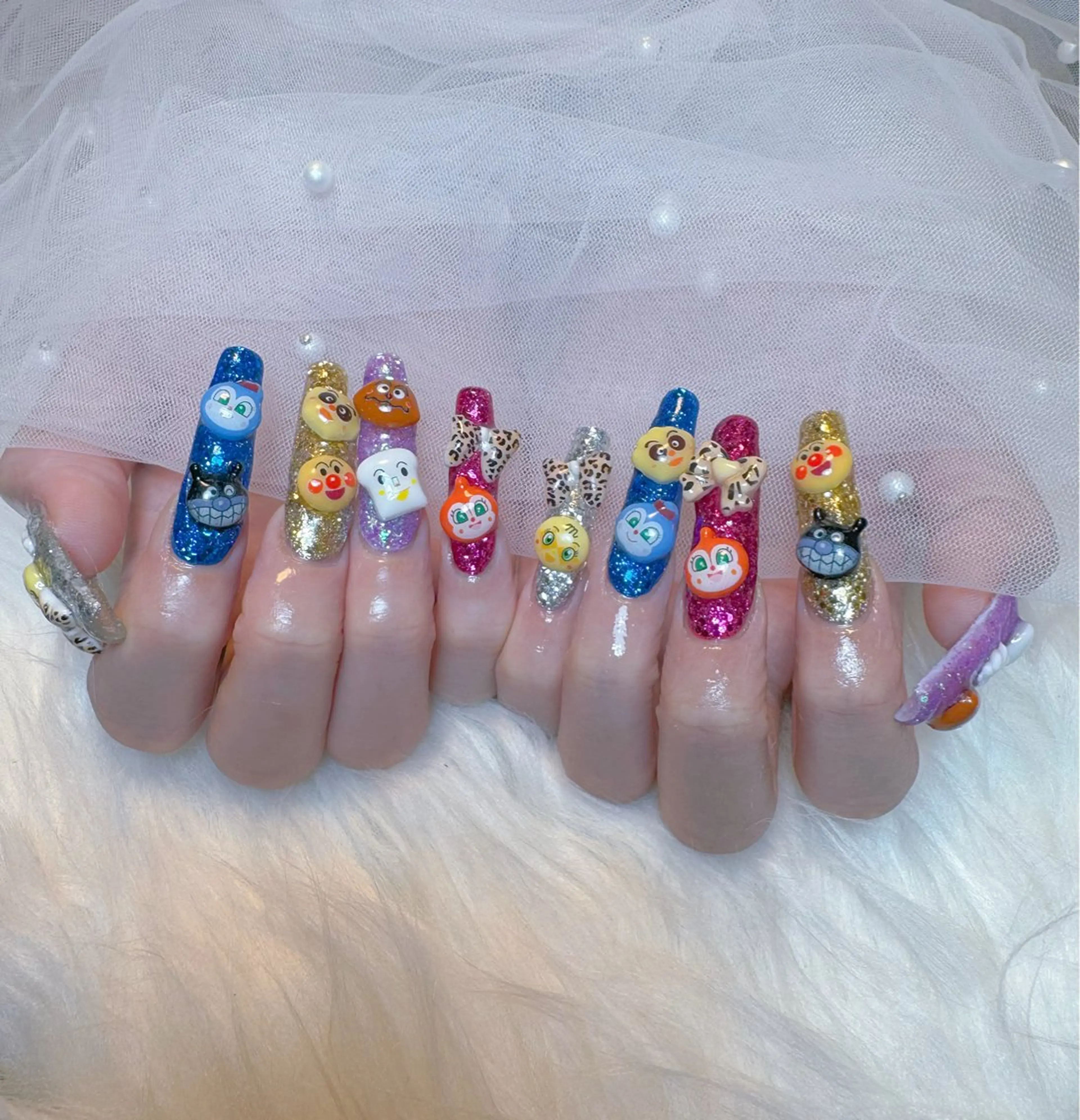 ネイル ブルー キラキラネイル ラメ(グリッター) ロングネイル リボン ハンドネイル K&R Nail所属・Nail Salon K&Rのネイルデザイン