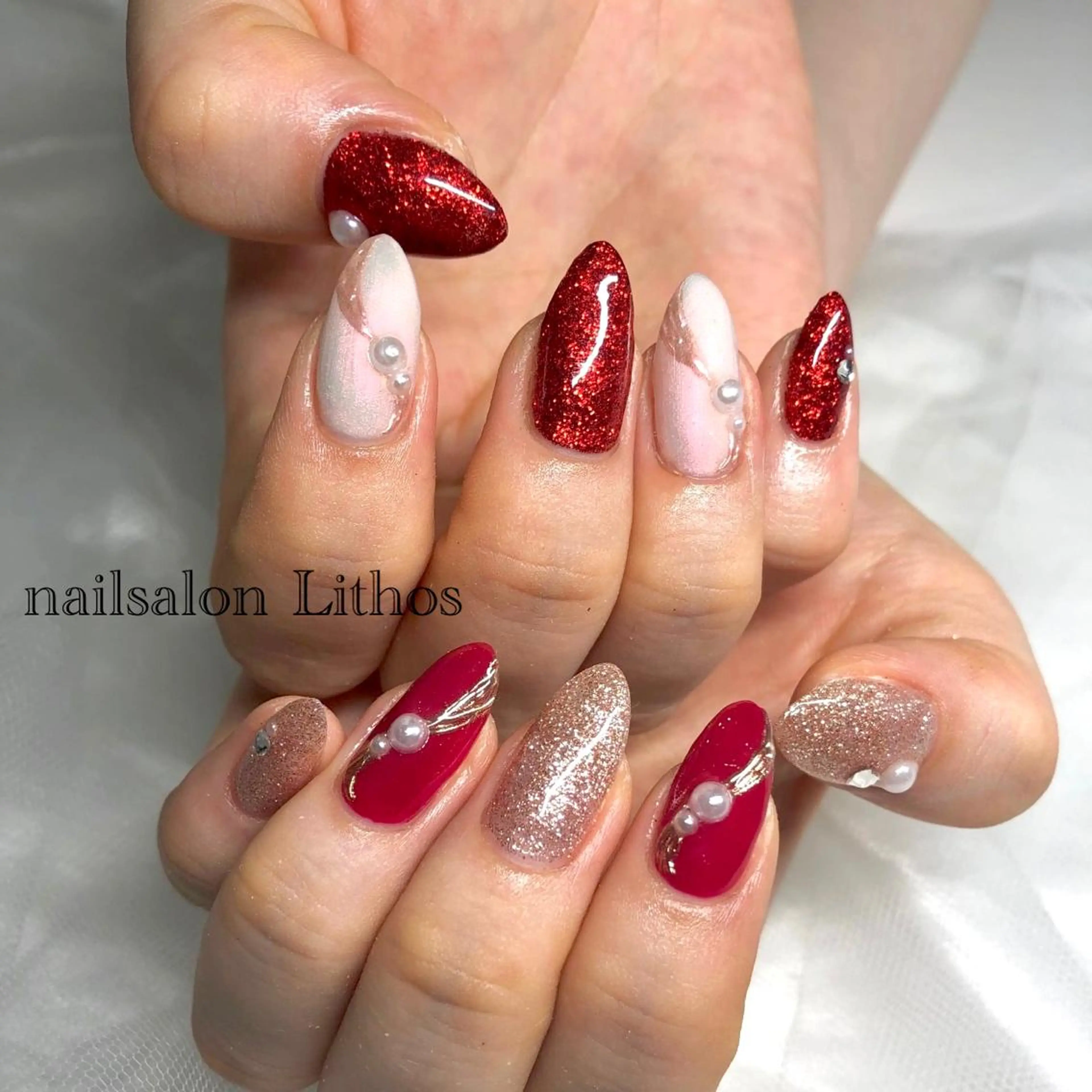 ネイル 赤色 ハンドネイル nailsalon Lithos所属・nailsalon Recontreのネイルデザイン