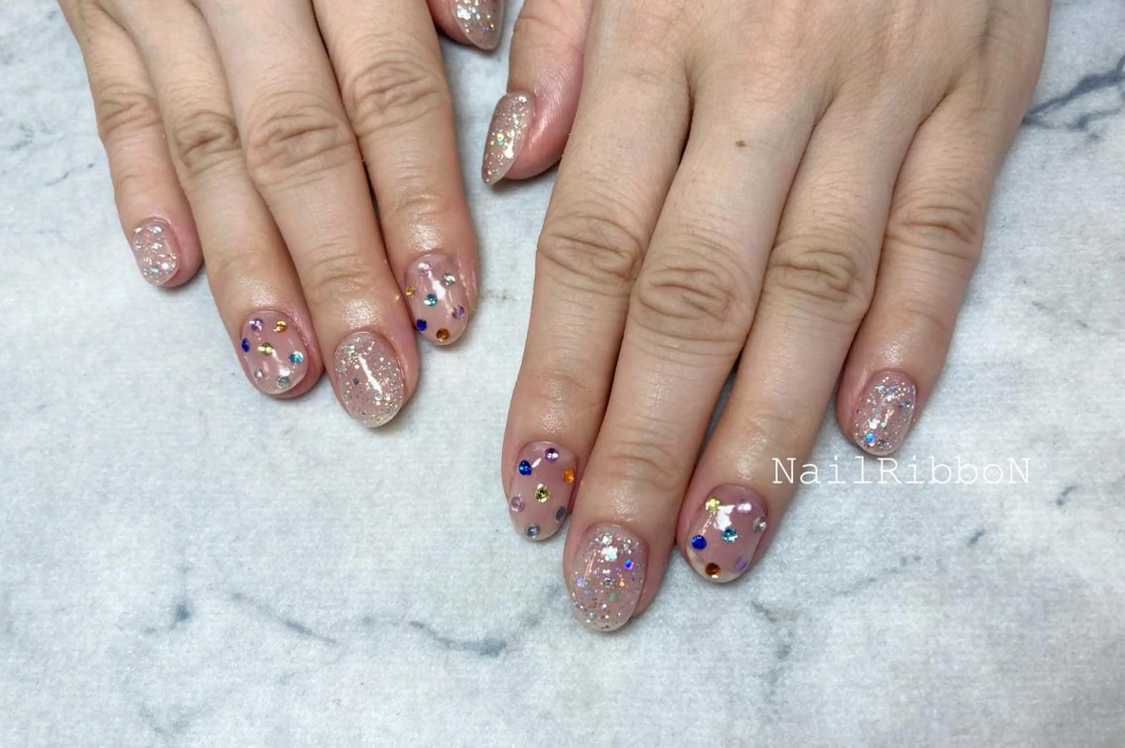 ネイル ネイルリボン 受付スタッフのネイルデザイン