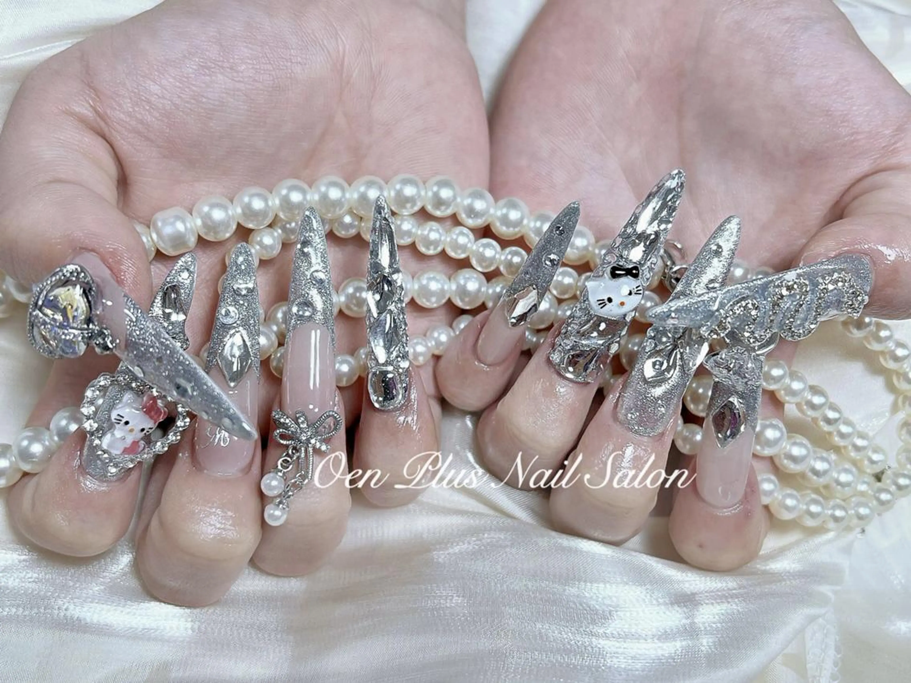 ネイル ジェルネイル ロングネイル パラジェル リボン スカルプネイル ハンドネイル ハンドケア One Plus Nail Salonのネイルデザイン
