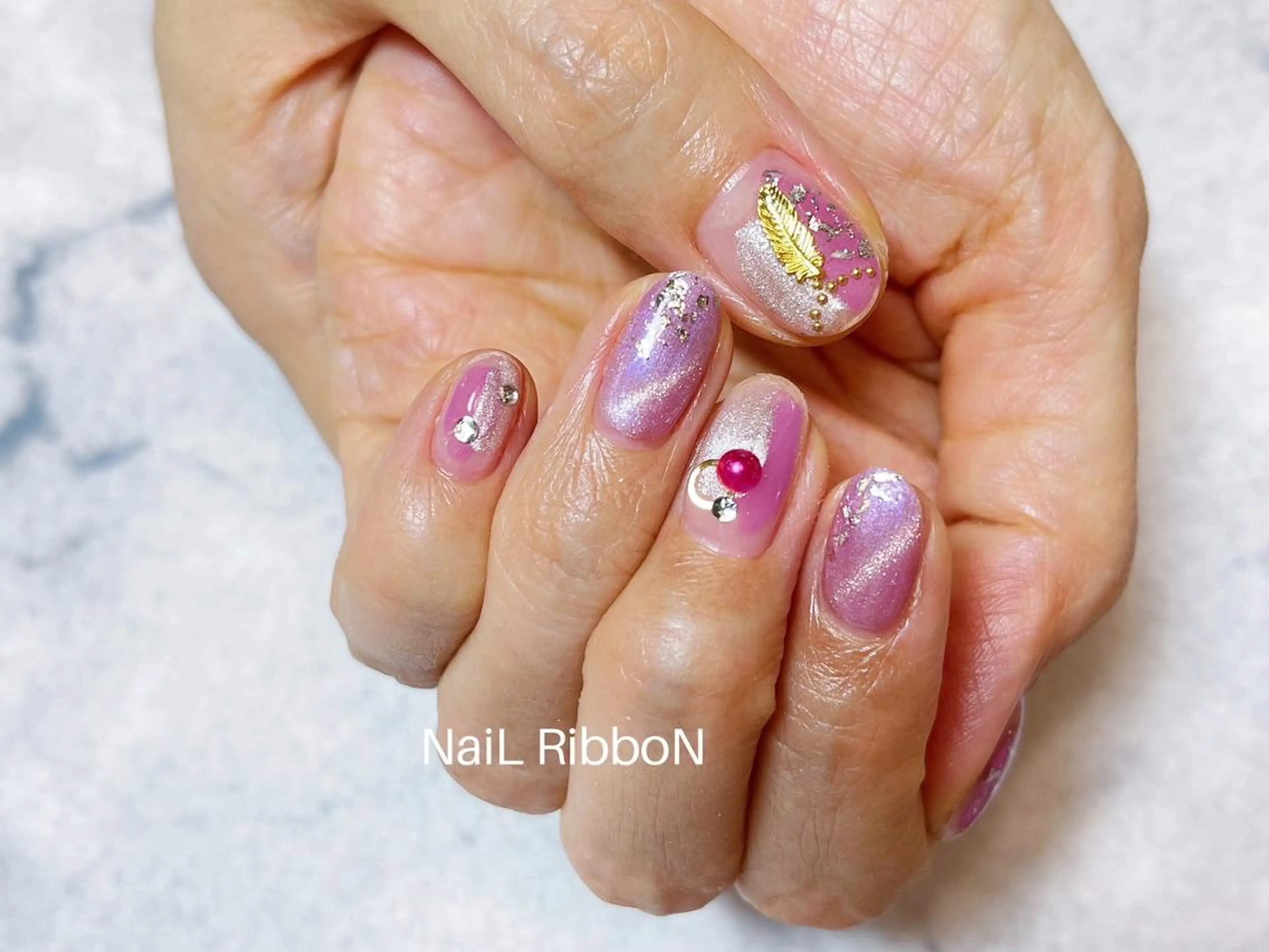 ネイル ネイルリボン 受付スタッフのネイルデザイン