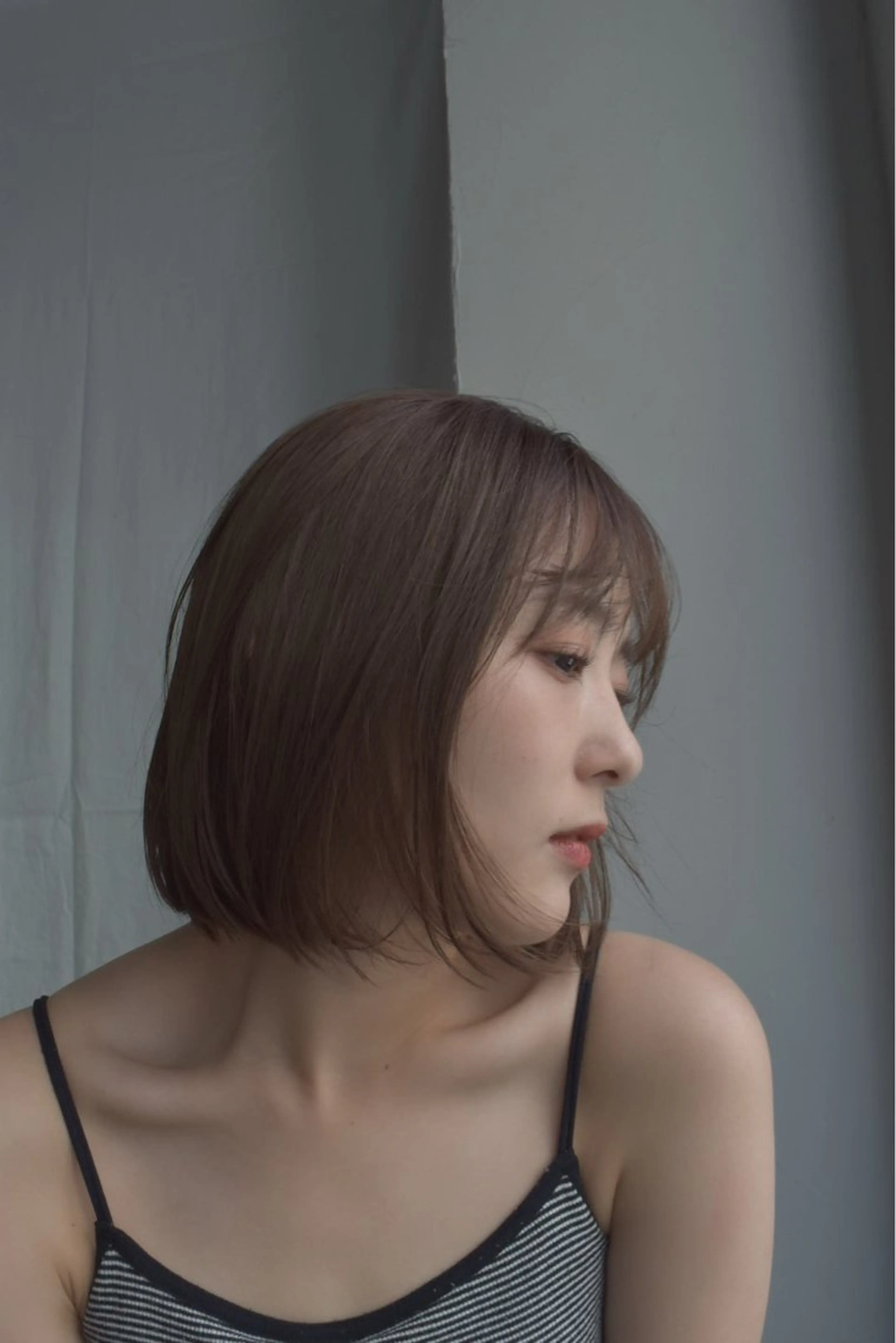 ミディアム ウシロダ メグミのヘアスタイル