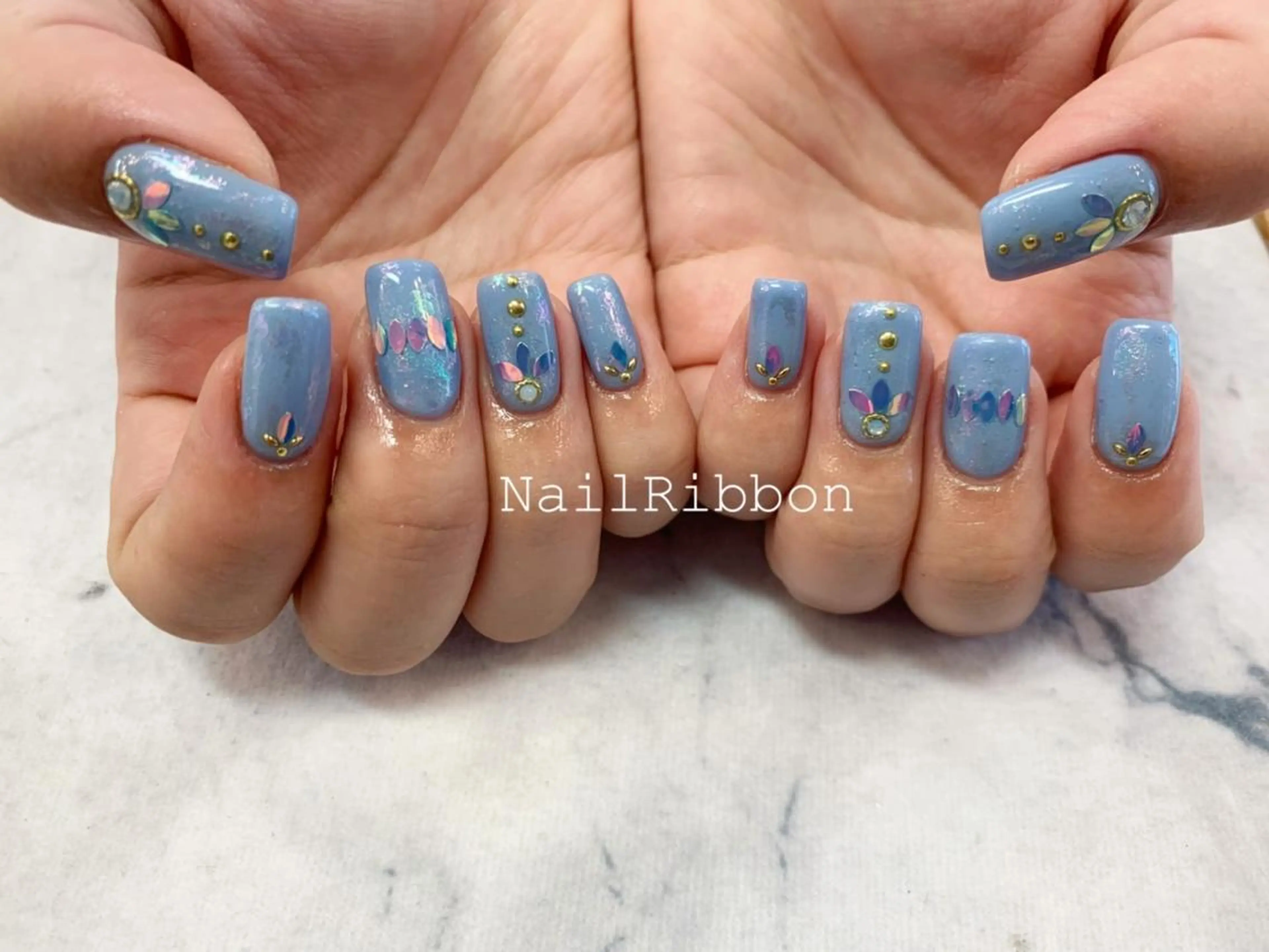 ネイル ネイルリボン 受付スタッフのネイルデザイン