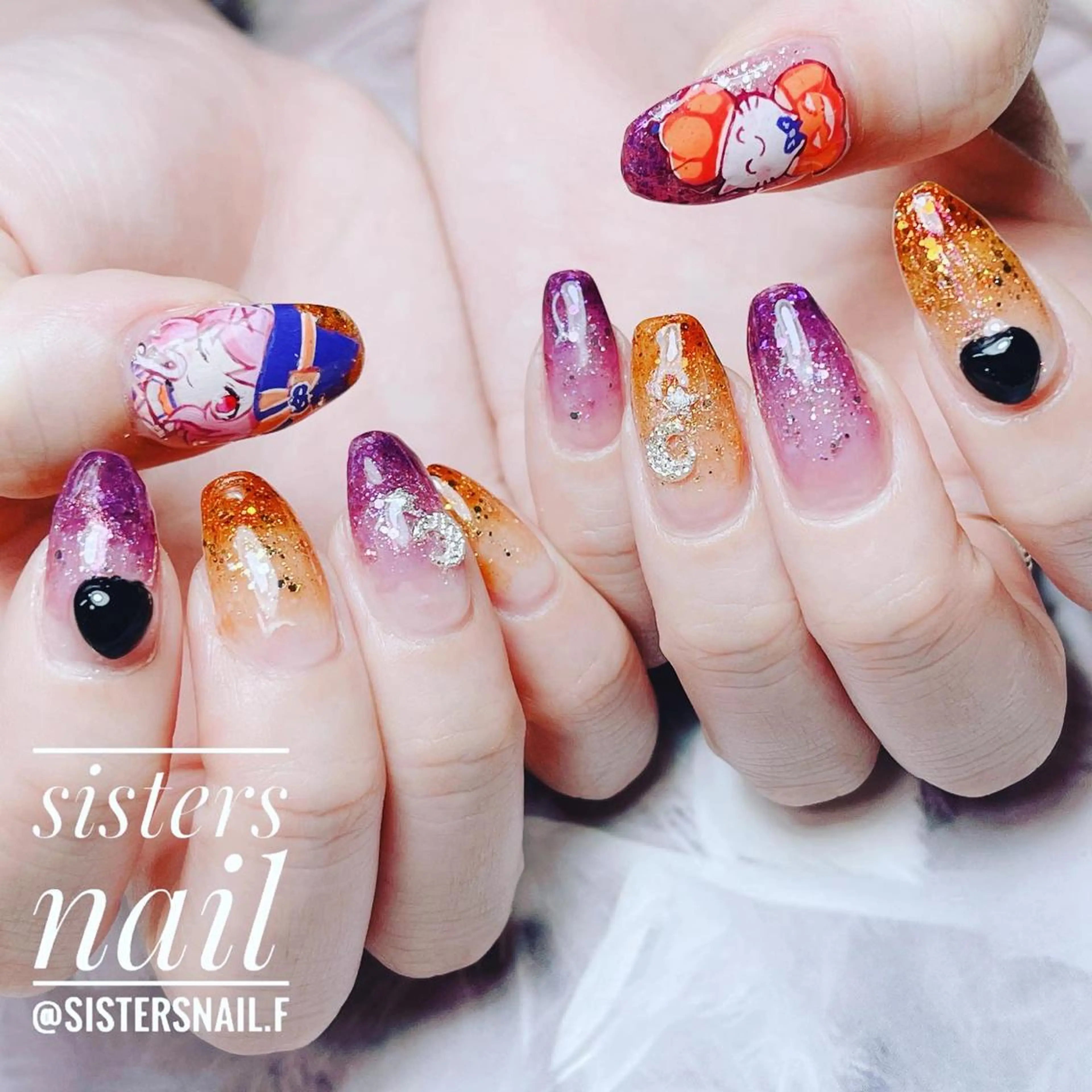 ネイル アートネイル ハロウィン ホログラムネイル キラキラネイル オレンジ sisters nail.fのネイルデザイン