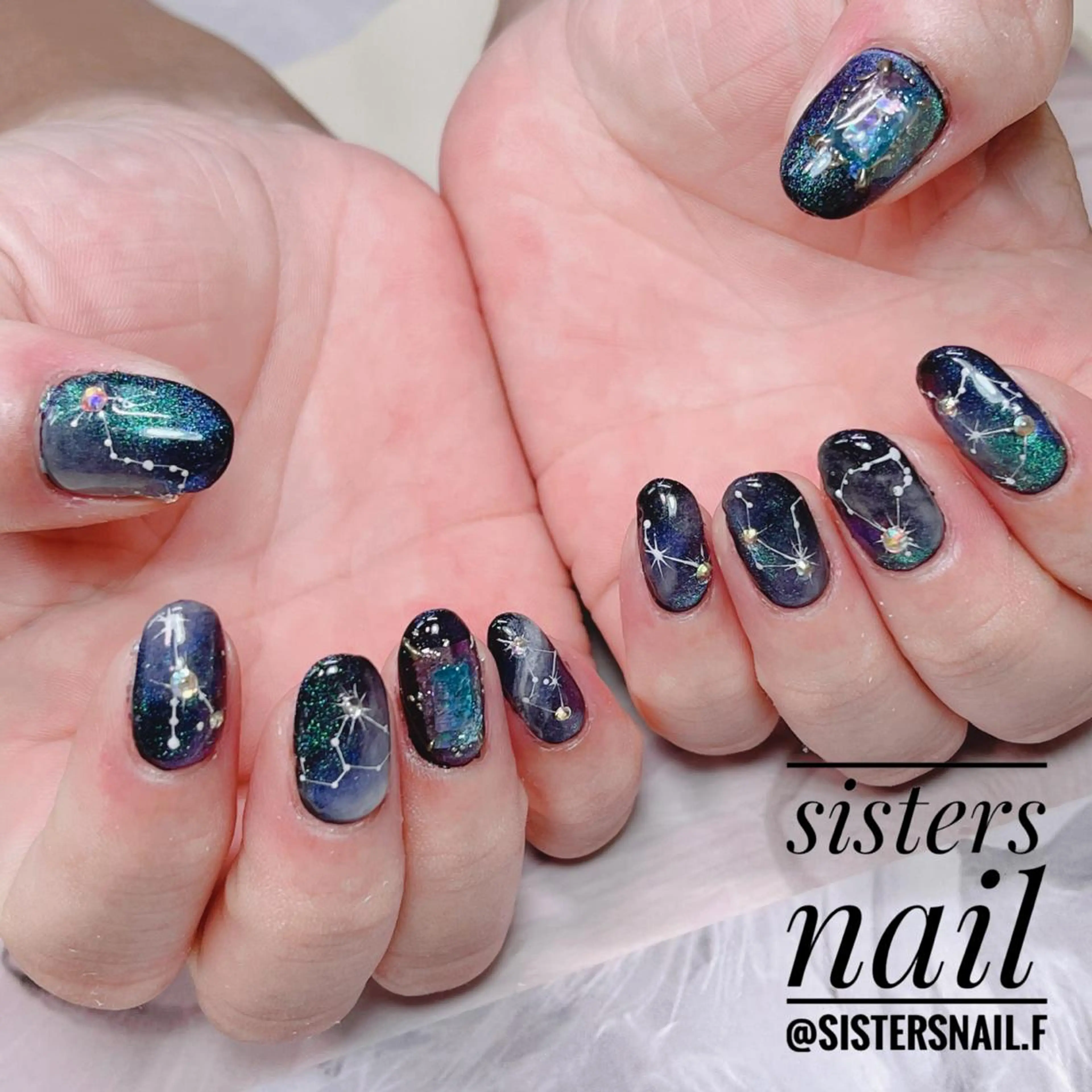 ネイル アートネイル キラキラネイル マグネットネイル 冬ネイル sisters nail.fのネイルデザイン