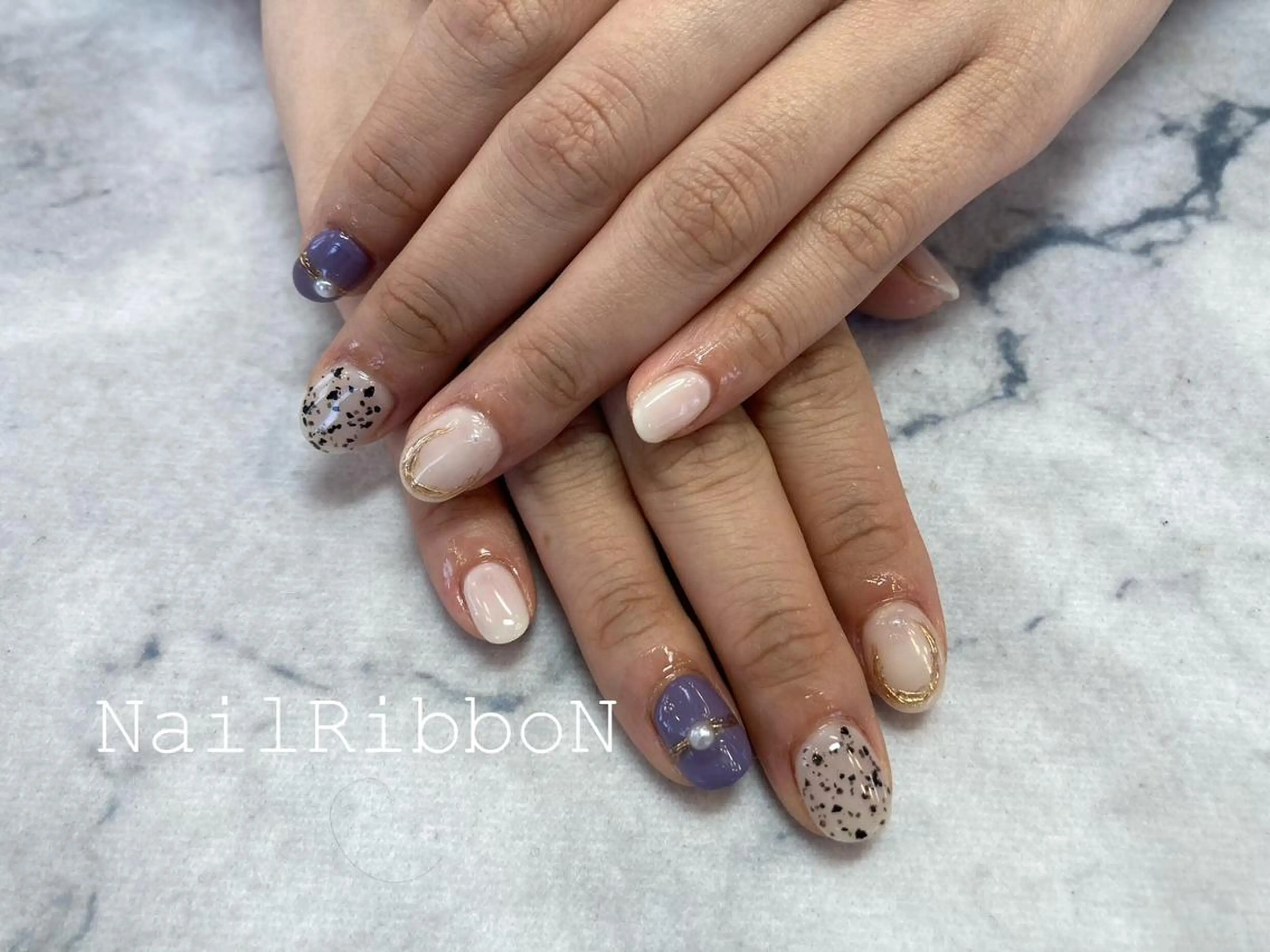 ネイル ネイルリボン 受付スタッフのネイルデザイン