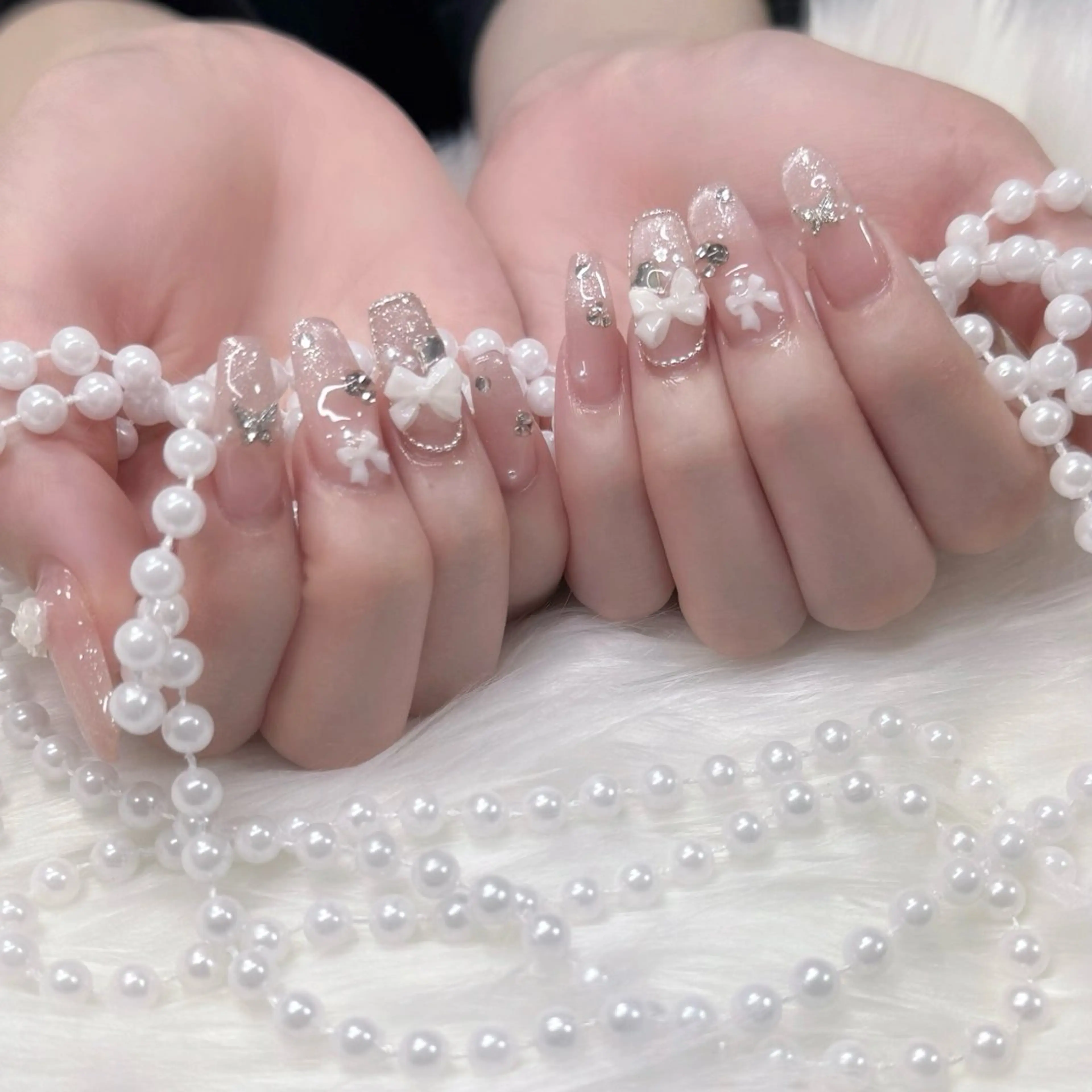 ネイル マグネットネイル ピンク リボン Zirnail🎀 rieのネイルデザイン