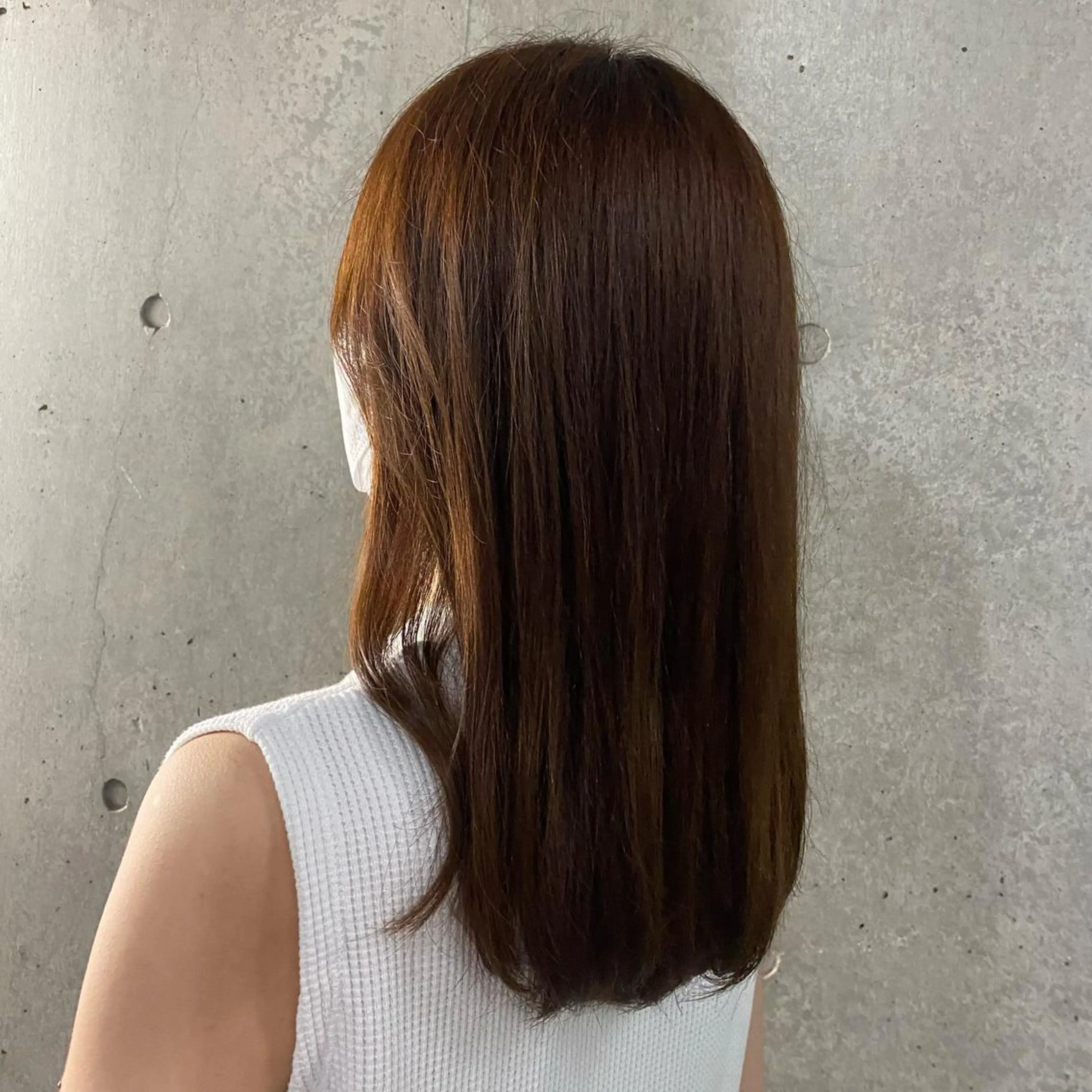 ロング オレンジブラウン センターパート/ニ ュアンスパーマのヘアスタイル