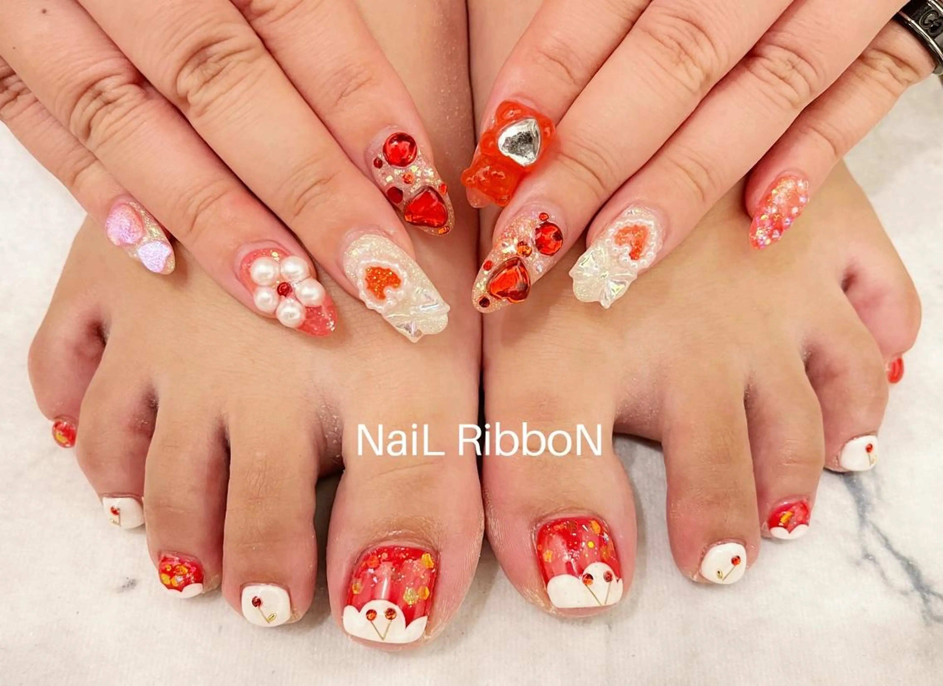 ネイル ネイルリボン 受付スタッフのネイルデザイン