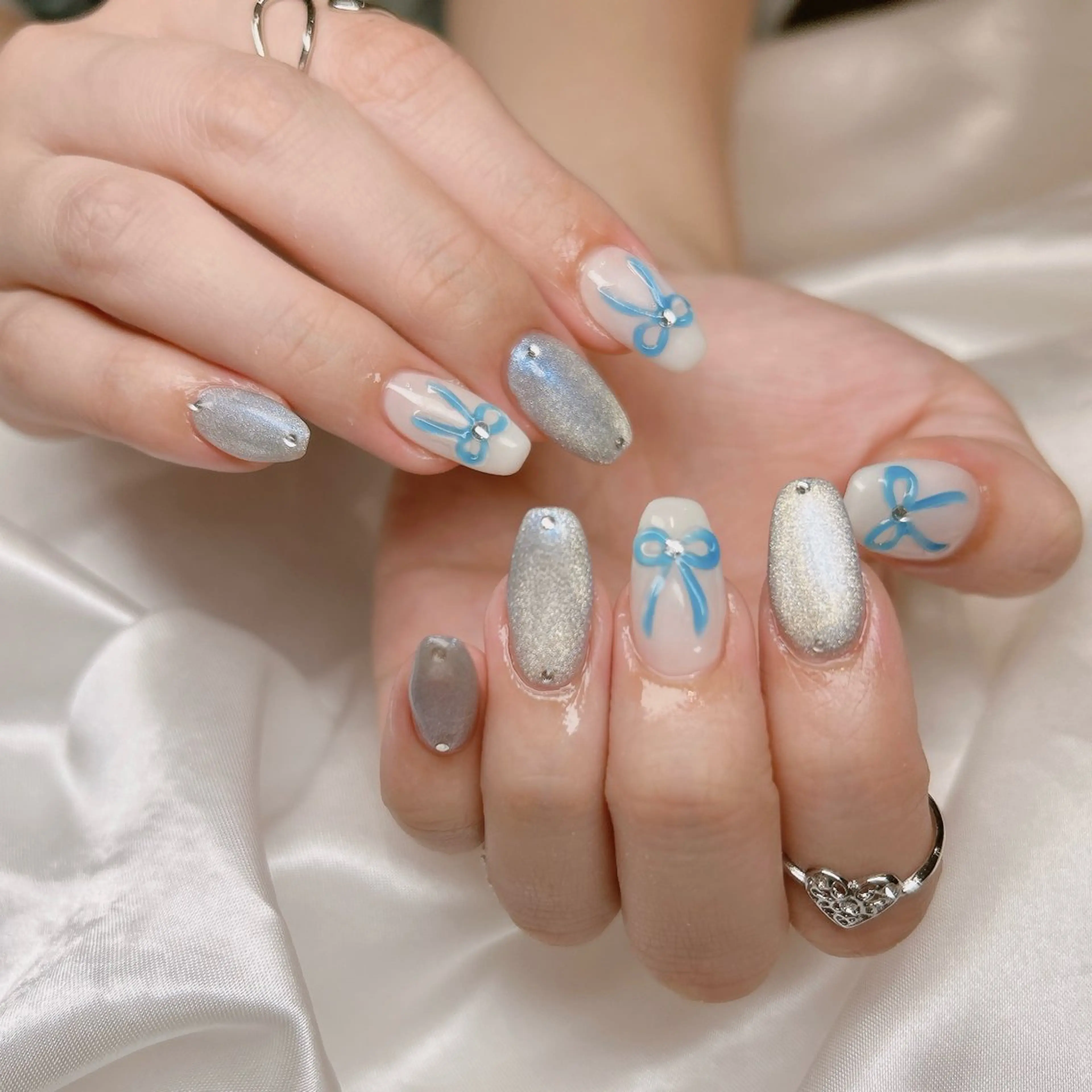 ネイル ぷっくりネイル リボン ハンドネイル junna のぞいてねのネイルデザイン