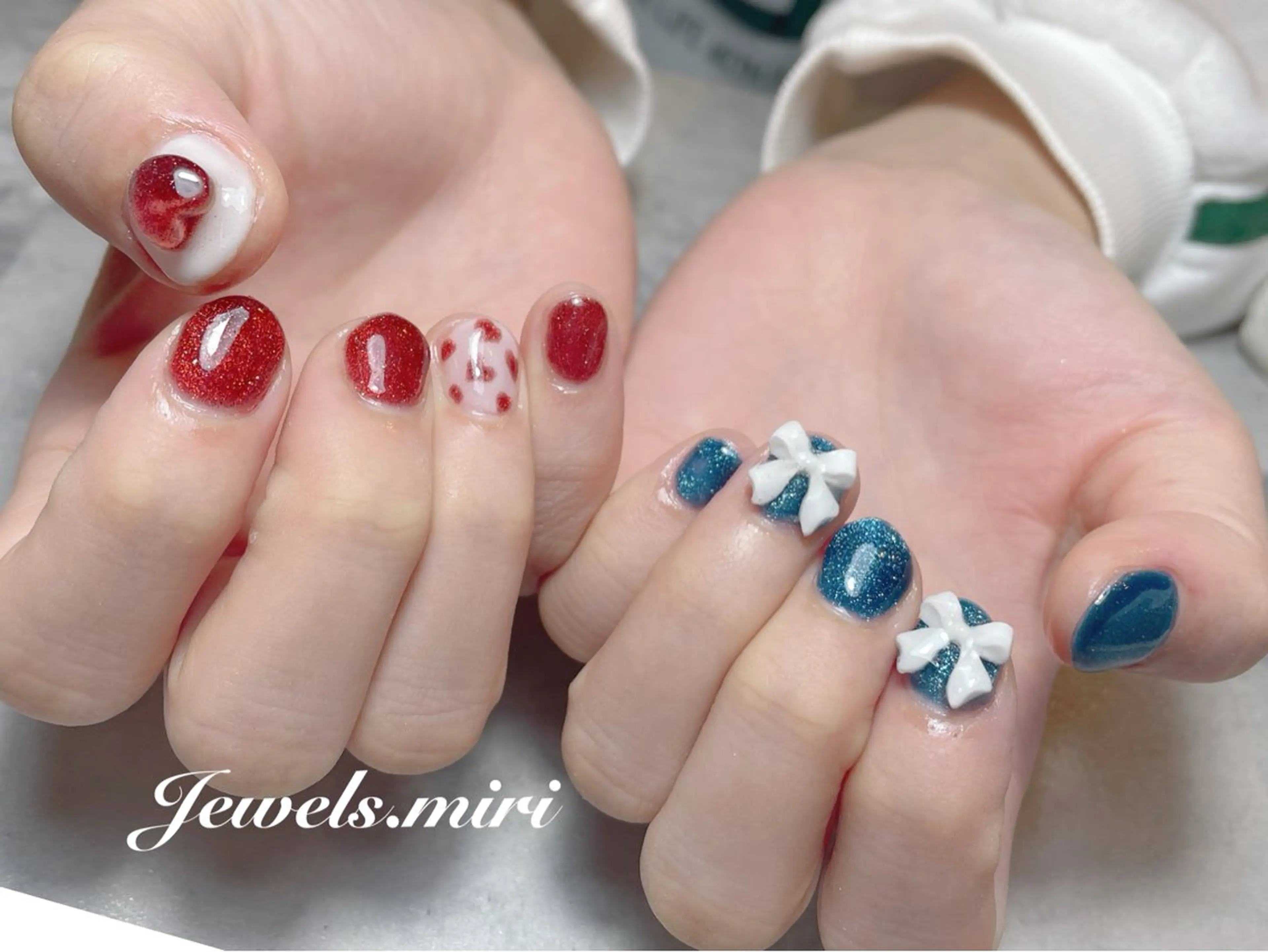 ネイル アートネイル ブルー ハート キラキラネイル マグネットネイル Jewels nail lily 白楽所属・ネイルサロン Jewels Mのネイルデザイン