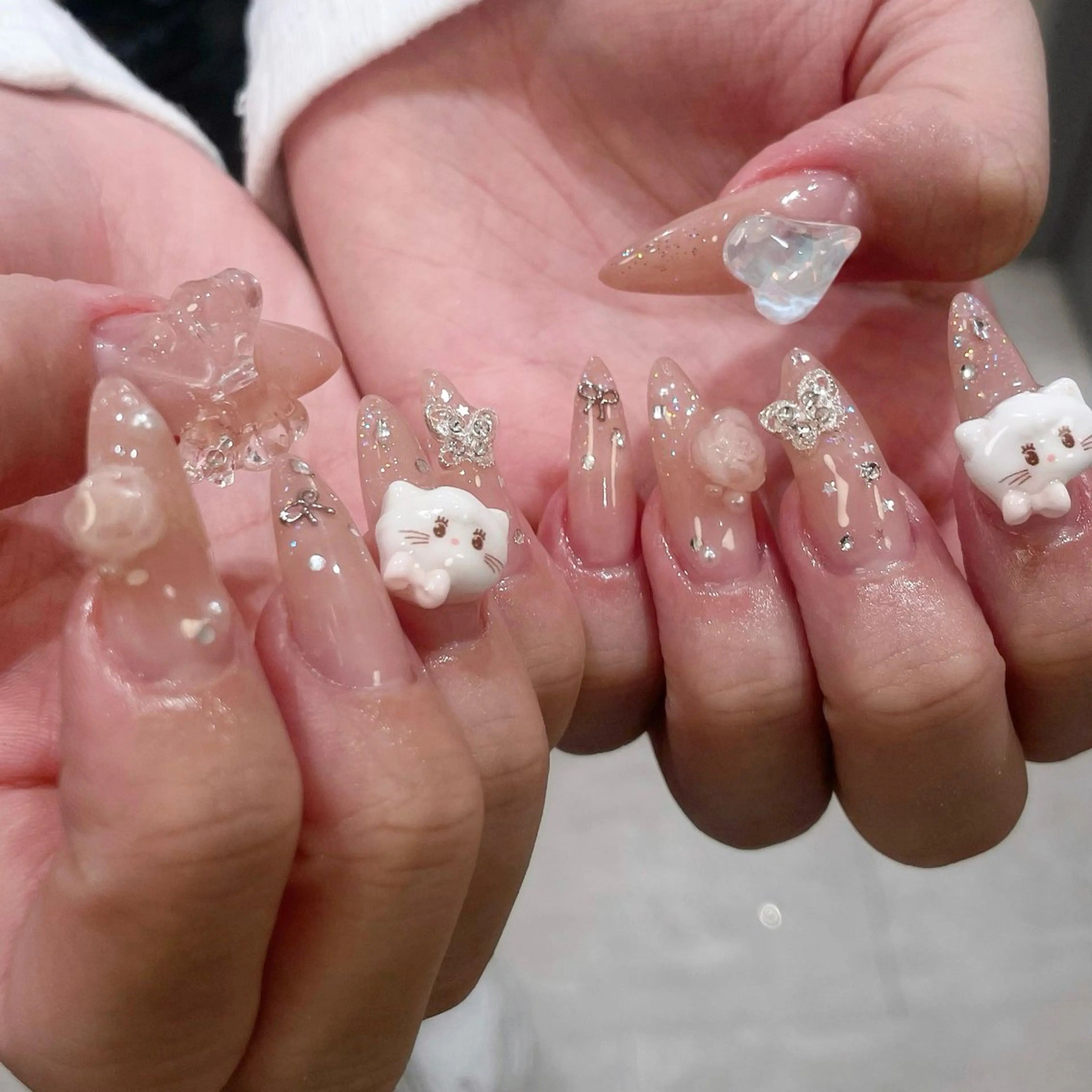 ネイル クリアネイル ハート ラメ(グリッター) ラメグラデーション リボン ハンドネイル aile d'Ange所属・aile d'Angeのネイルデザイン