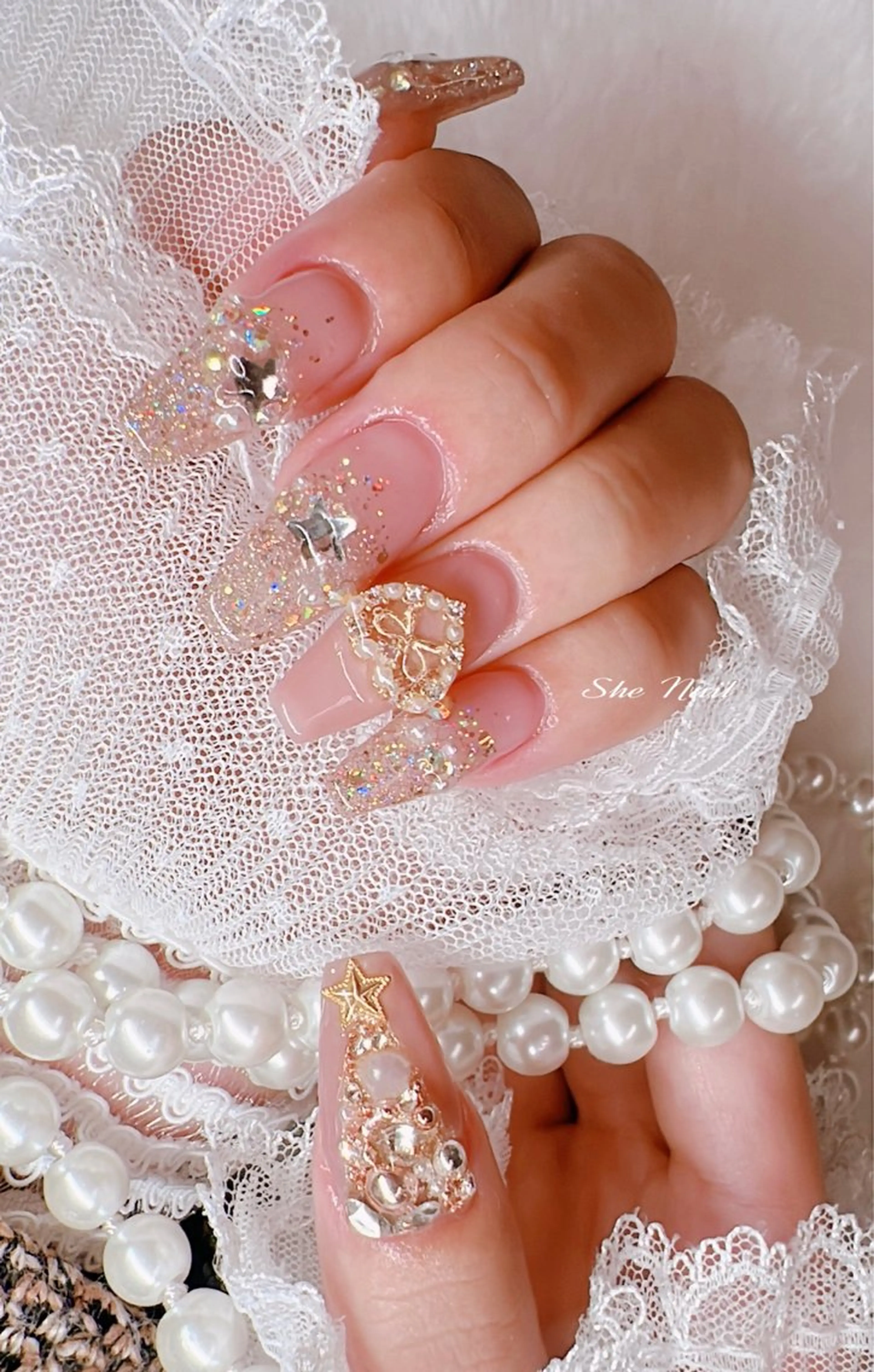 ネイル チークネイル 長さ出し フレンチネイル ハート キラキラネイル ハンドネイル She   Nail所属・ISA_ BELLAのネイルデザイン