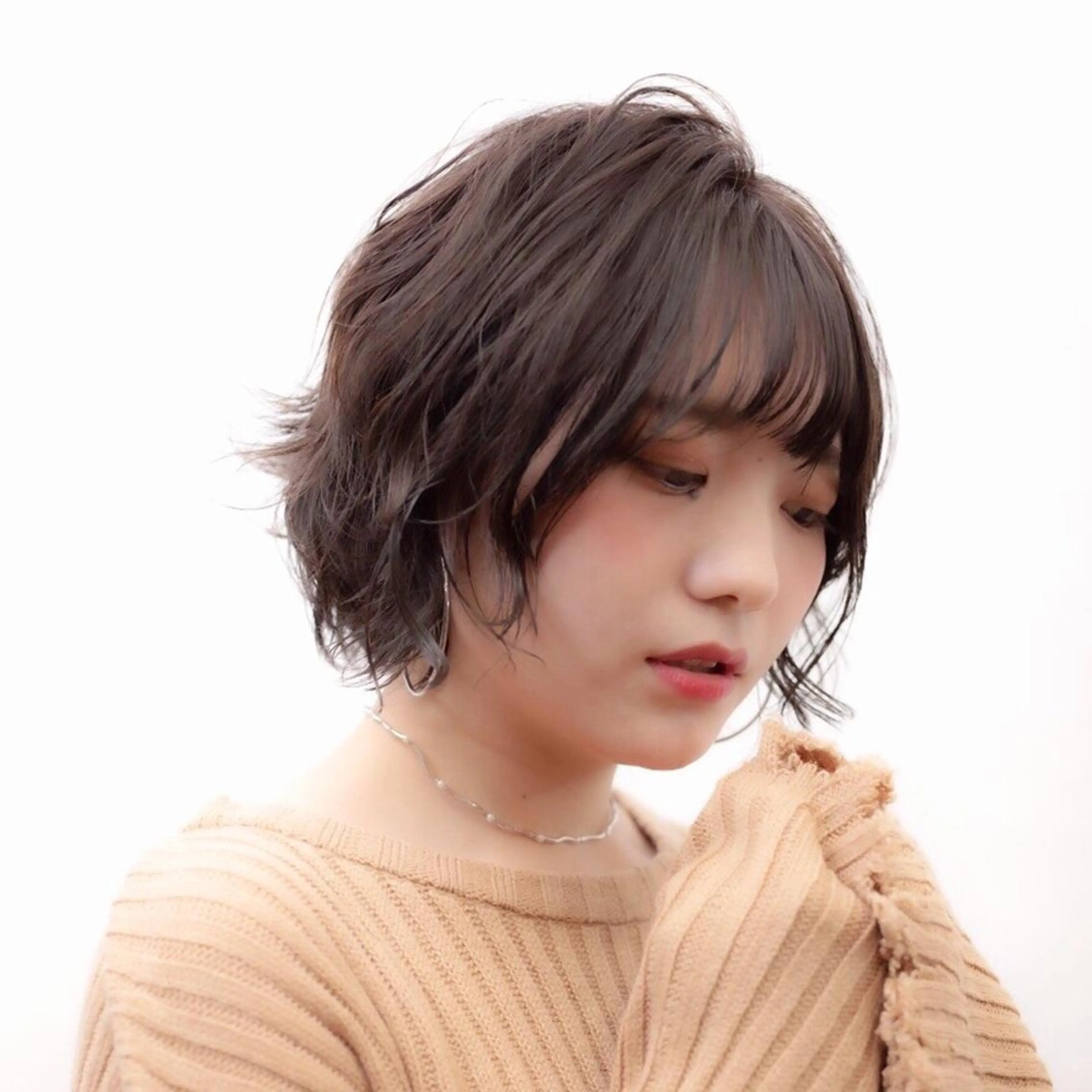 ミディアム カラー 🟢ウルフ／スパイラ ルパーマ／大西🟢のヘアスタイル