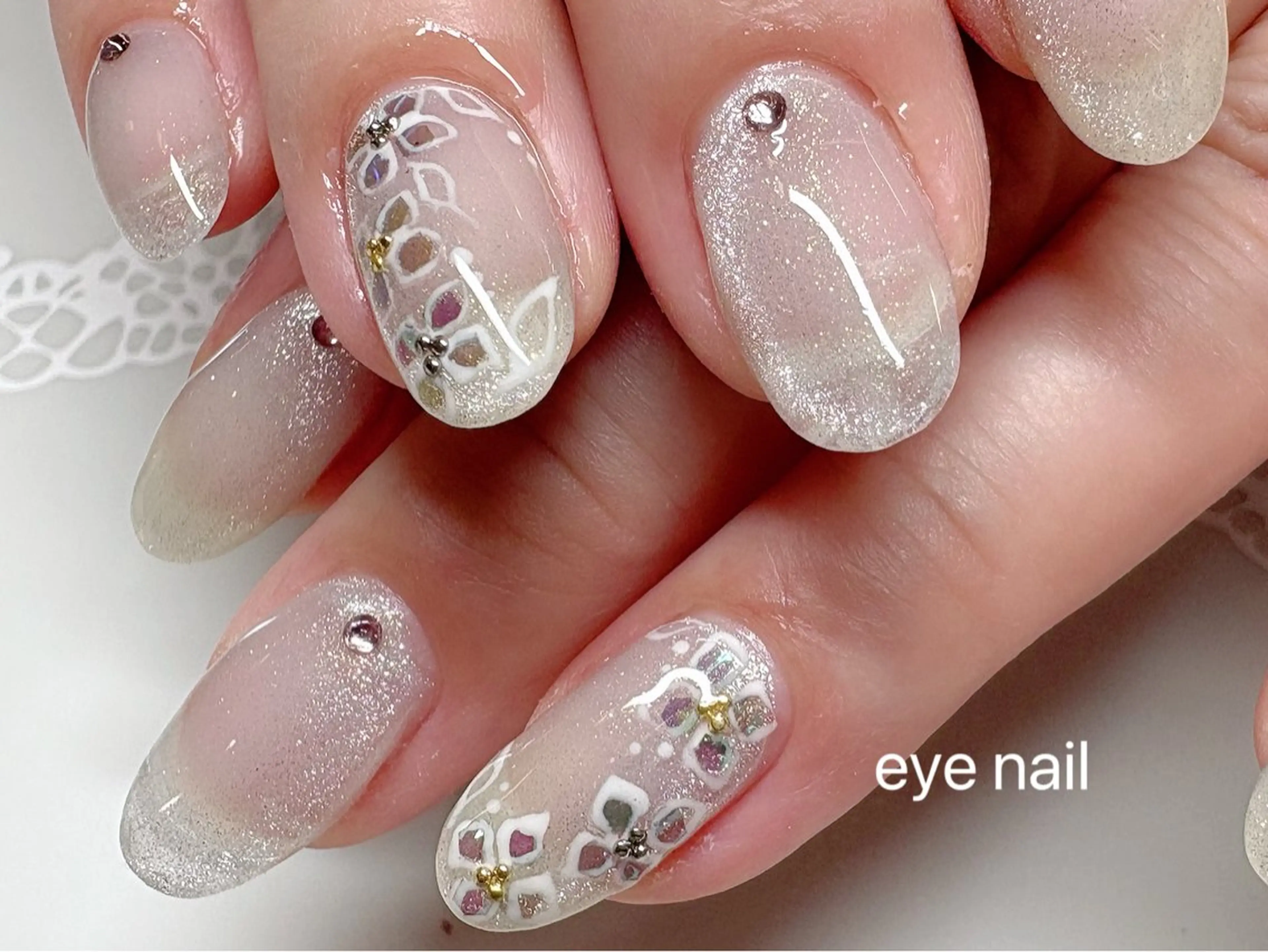 ネイル アートネイル ジェルネイル マグネットネイル ストーンネイル ホワイト ハンドネイル Eye nailのネイルデザイン