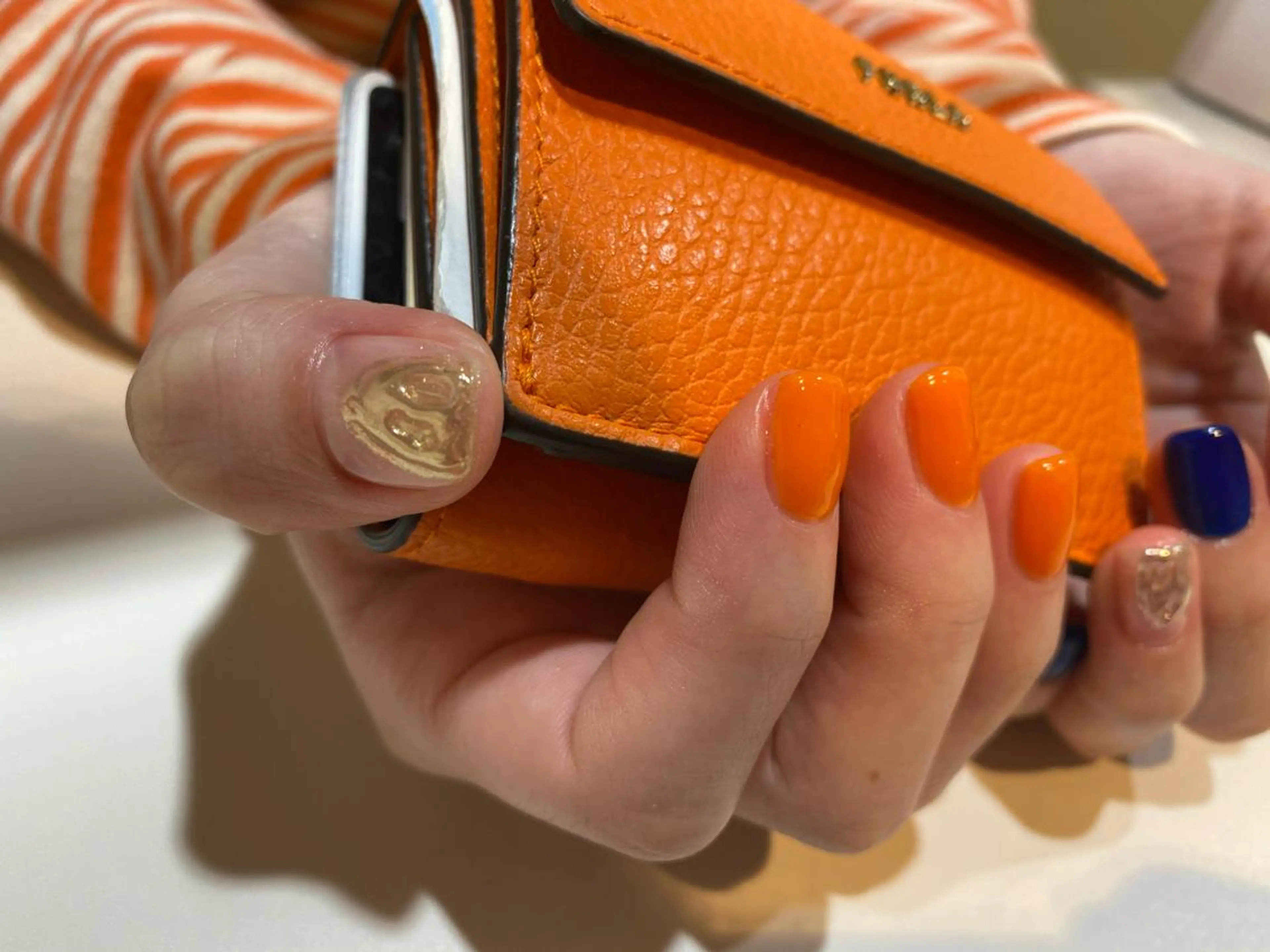 ネイル ミラーネイル ワンカラーネイル オレンジ 表参道colore所属・表参道colore店 REICAのネイルデザイン