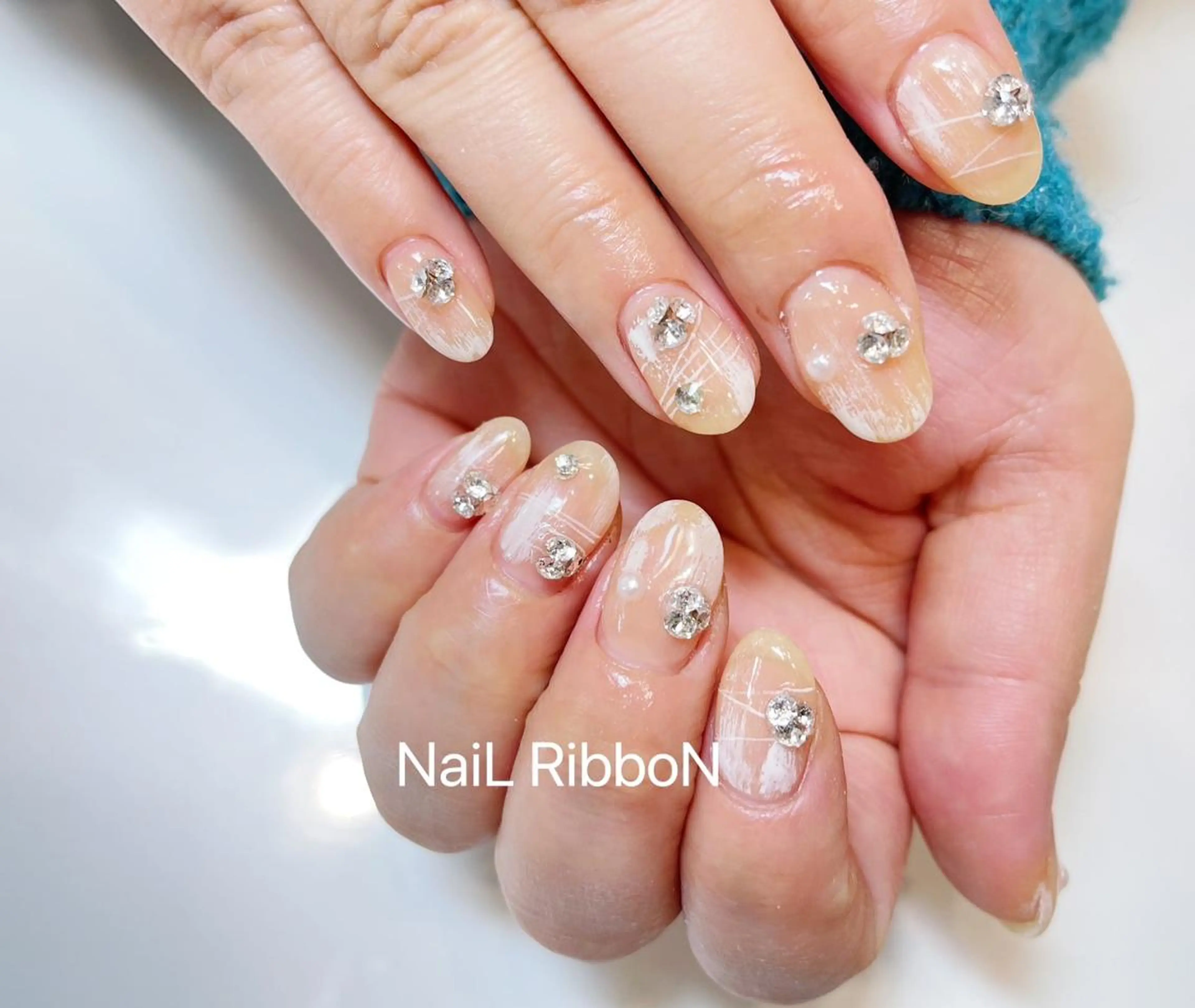 ネイル ネイルリボン 受付スタッフのネイルデザイン