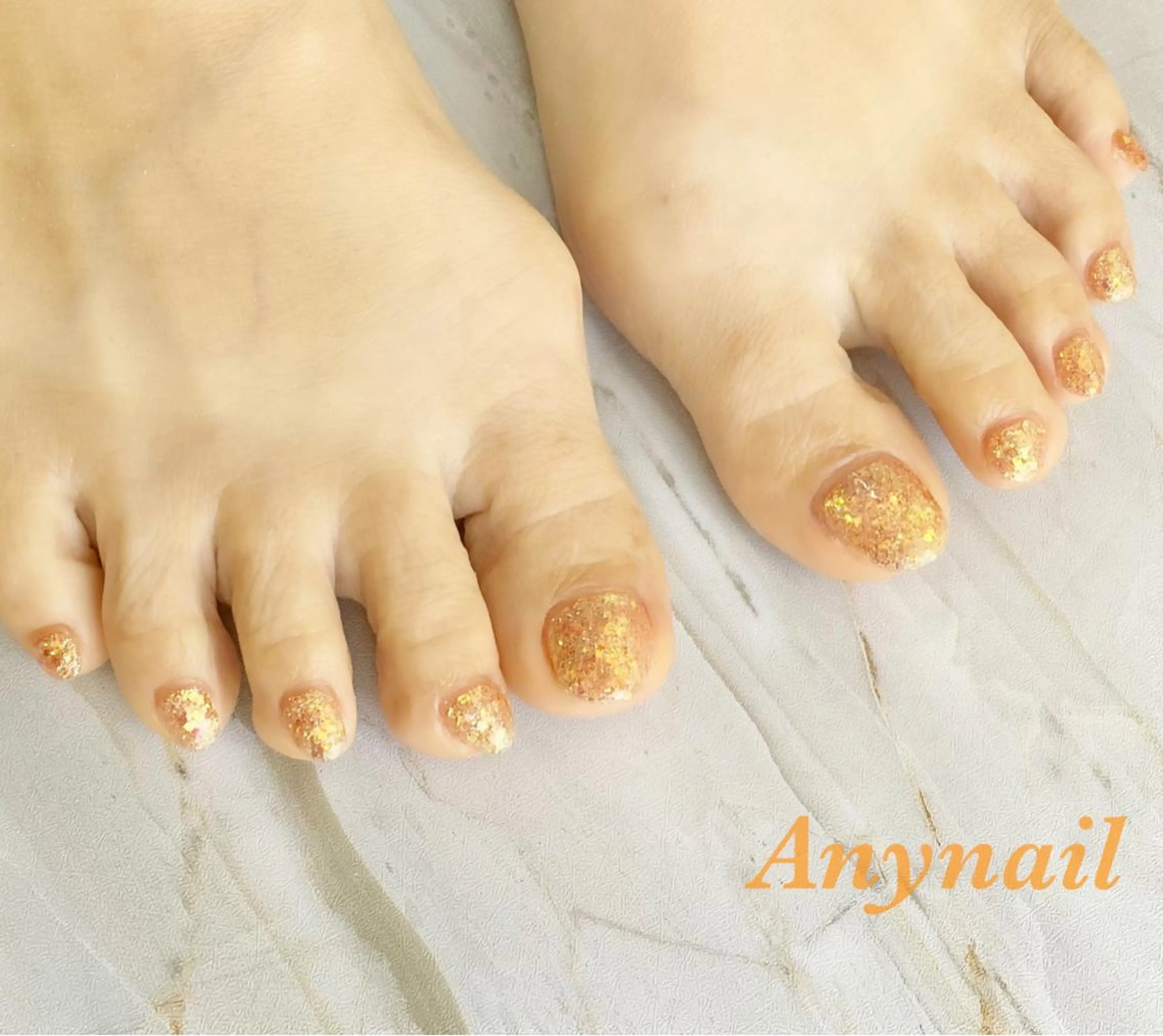 ネイル ブルー フットネイル ラメ(グリッター) ワンカラーネイル オレンジ フットネイル 岩澤 恵子のネイルデザイン
