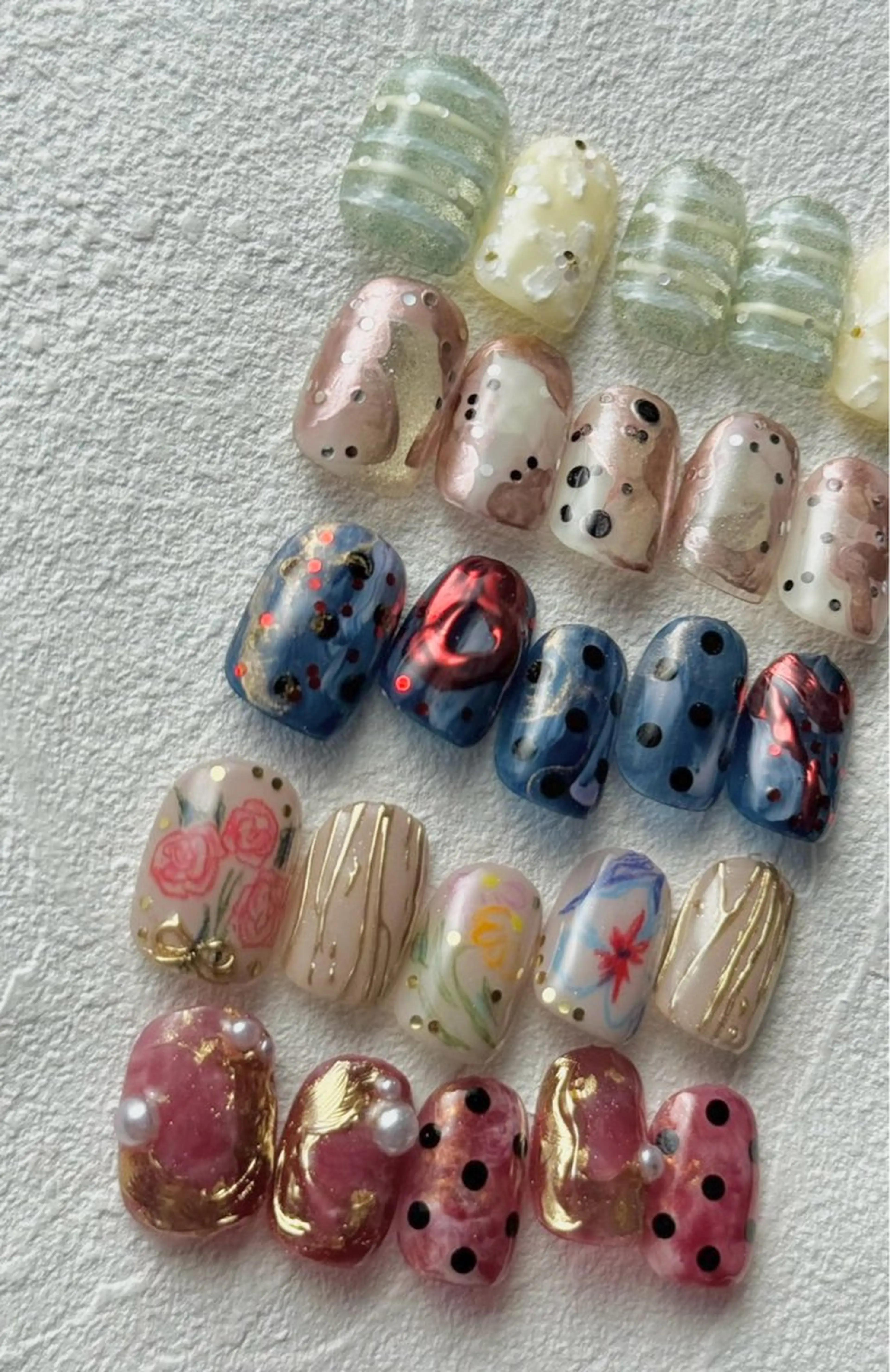 [𝐡𝐚𝐧𝐝]個性派ニュアンス定額デザインの写真