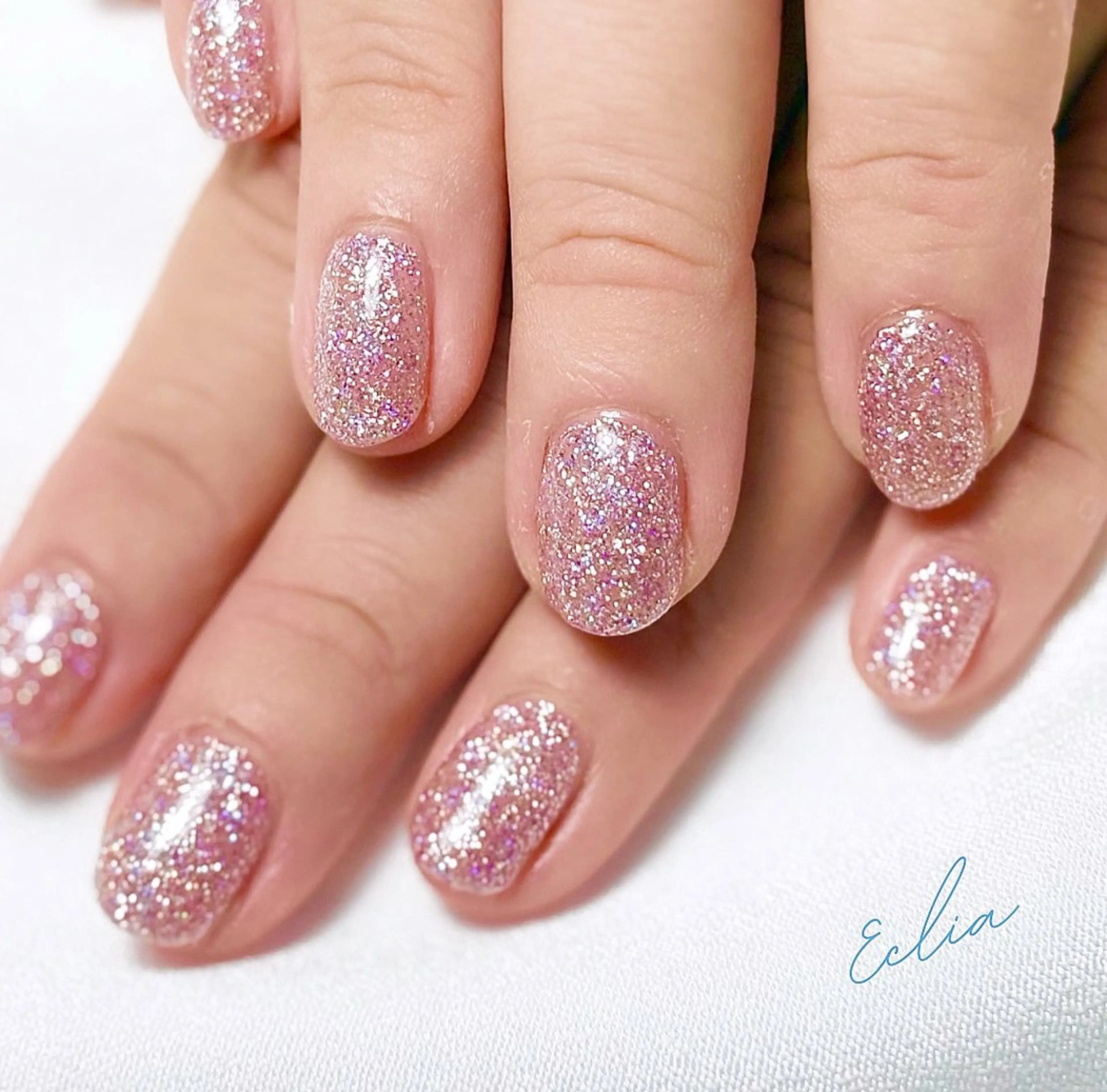 ネイル 桜ネイル キラキラネイル ワンカラーネイル ピンク ハンドネイル nailsalon Ecliaのネイルデザイン