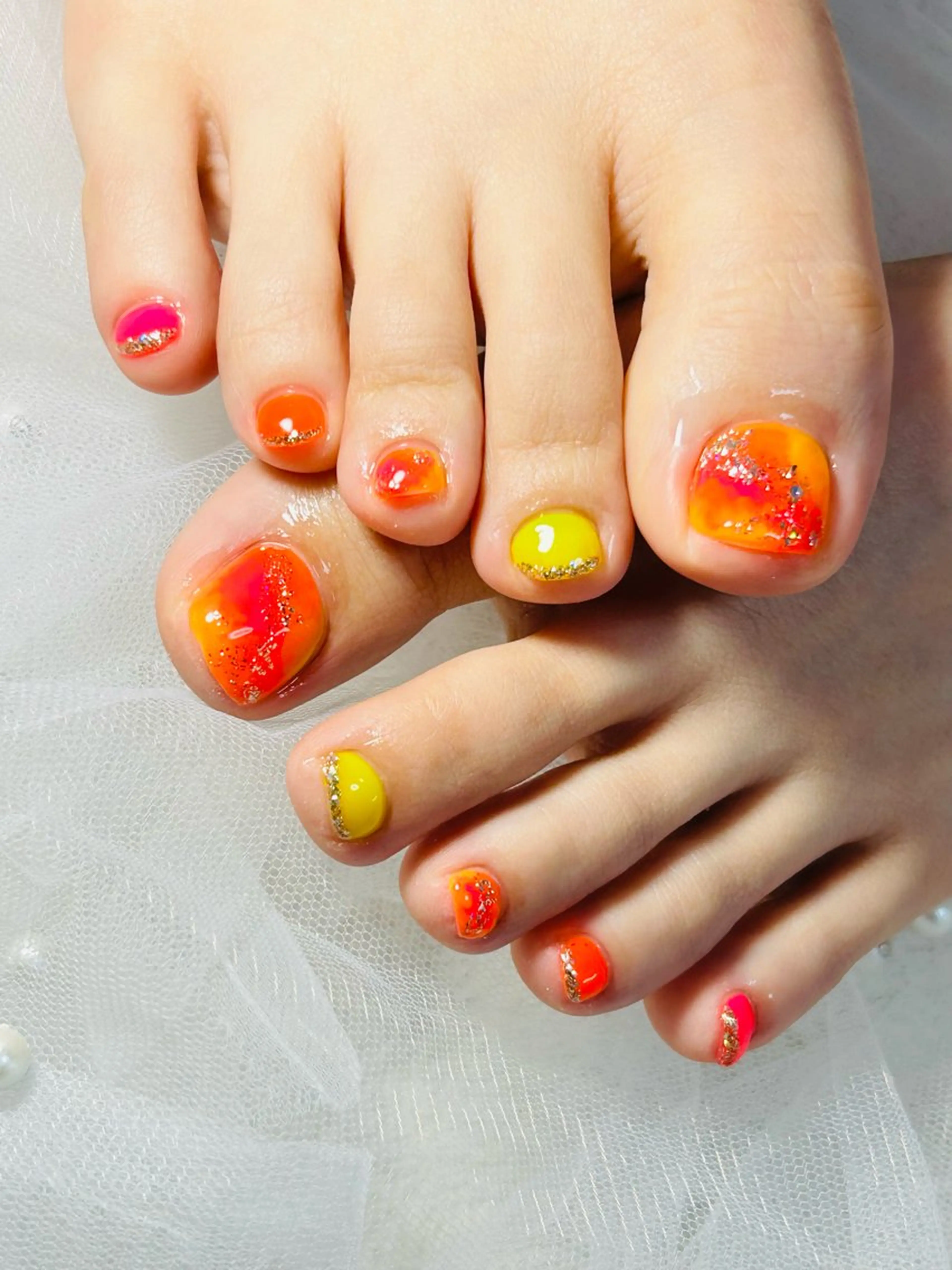 ネイル フットネイル オレンジ 金森 真以のネイルデザイン