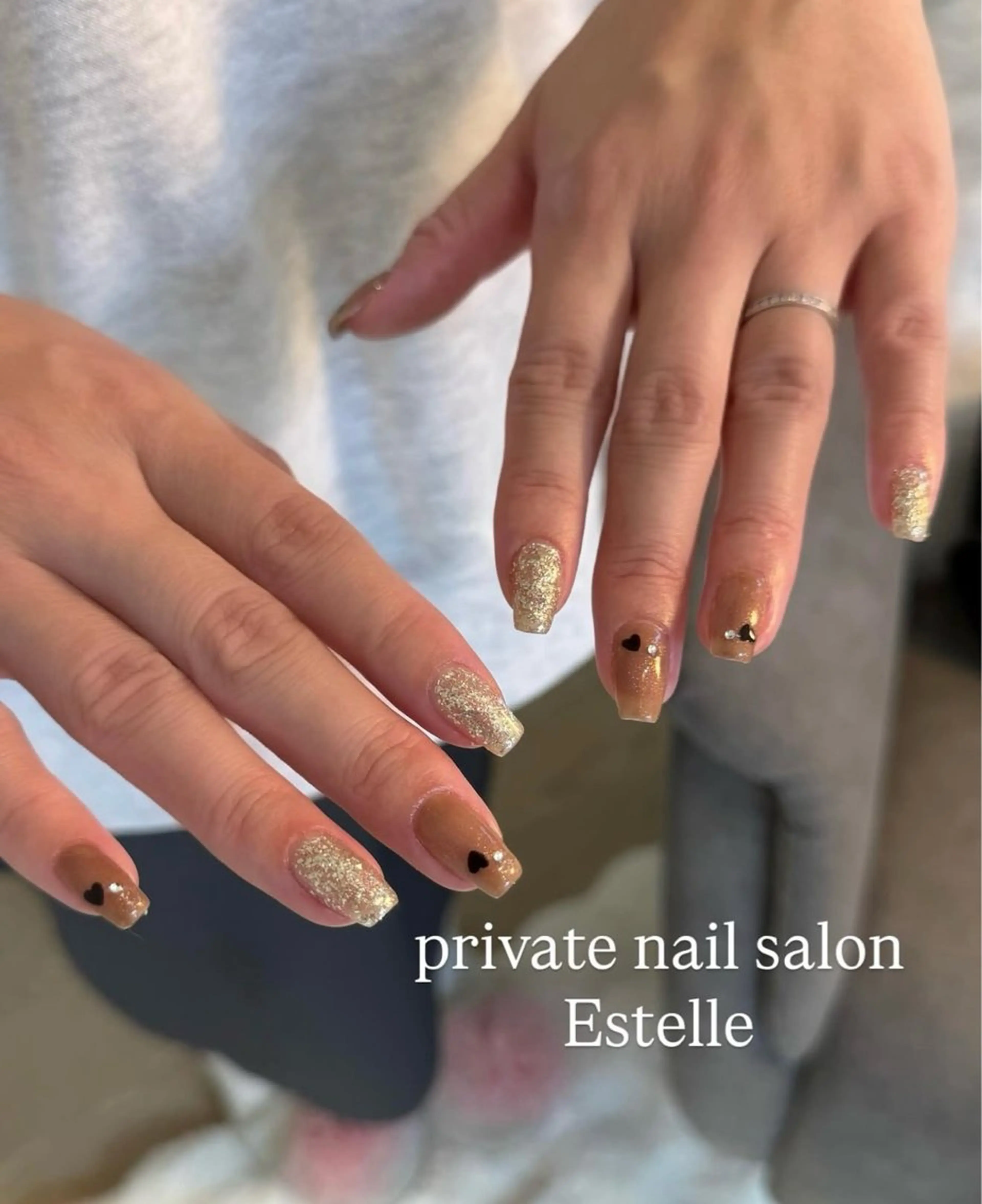 ネイル ブラウン ハート ラメ(グリッター) オレンジ ストーンネイル ハンドネイル nail salon Estelleのネイルデザイン
