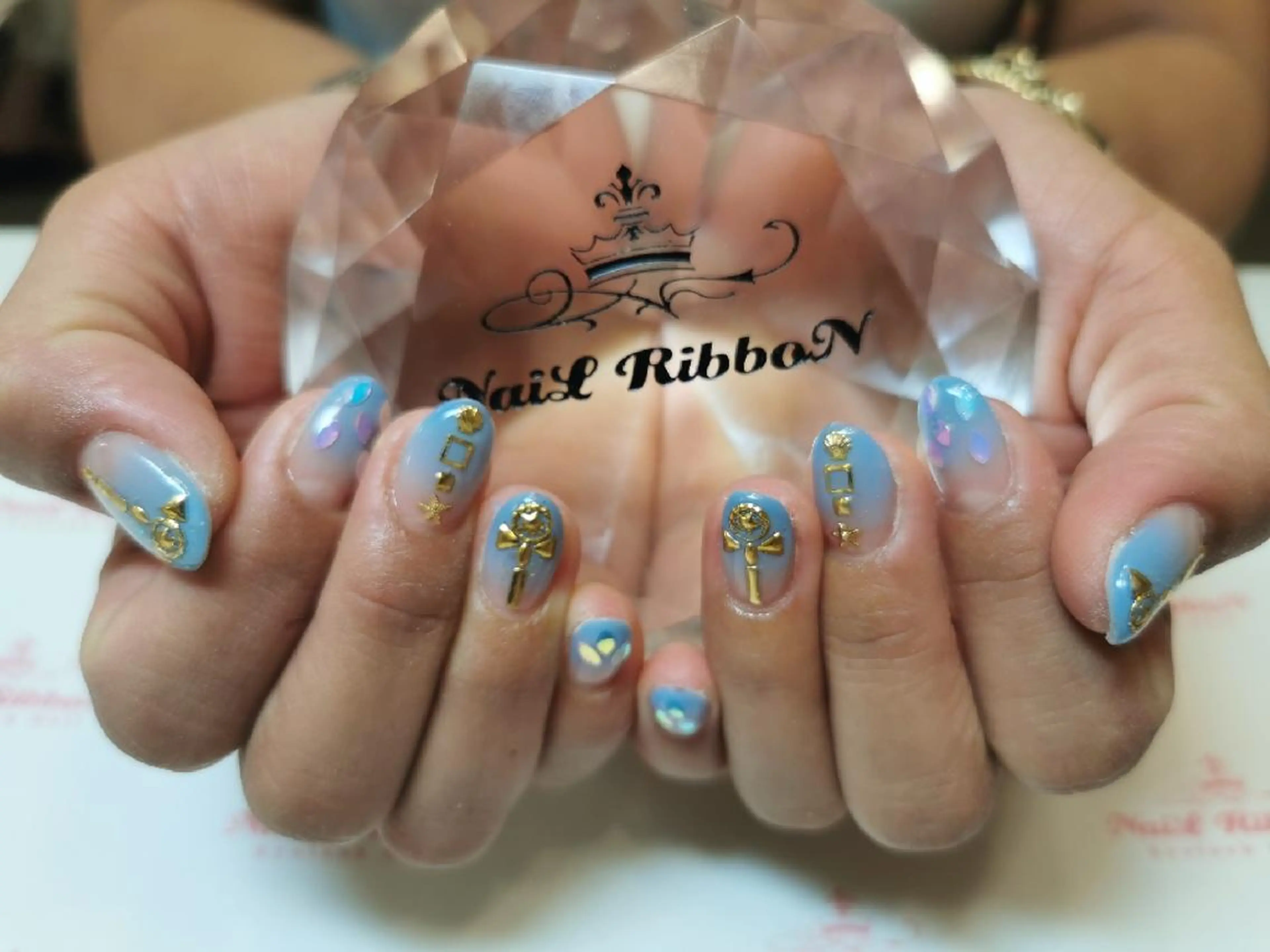 ネイル ネイルリボン 受付スタッフのネイルデザイン