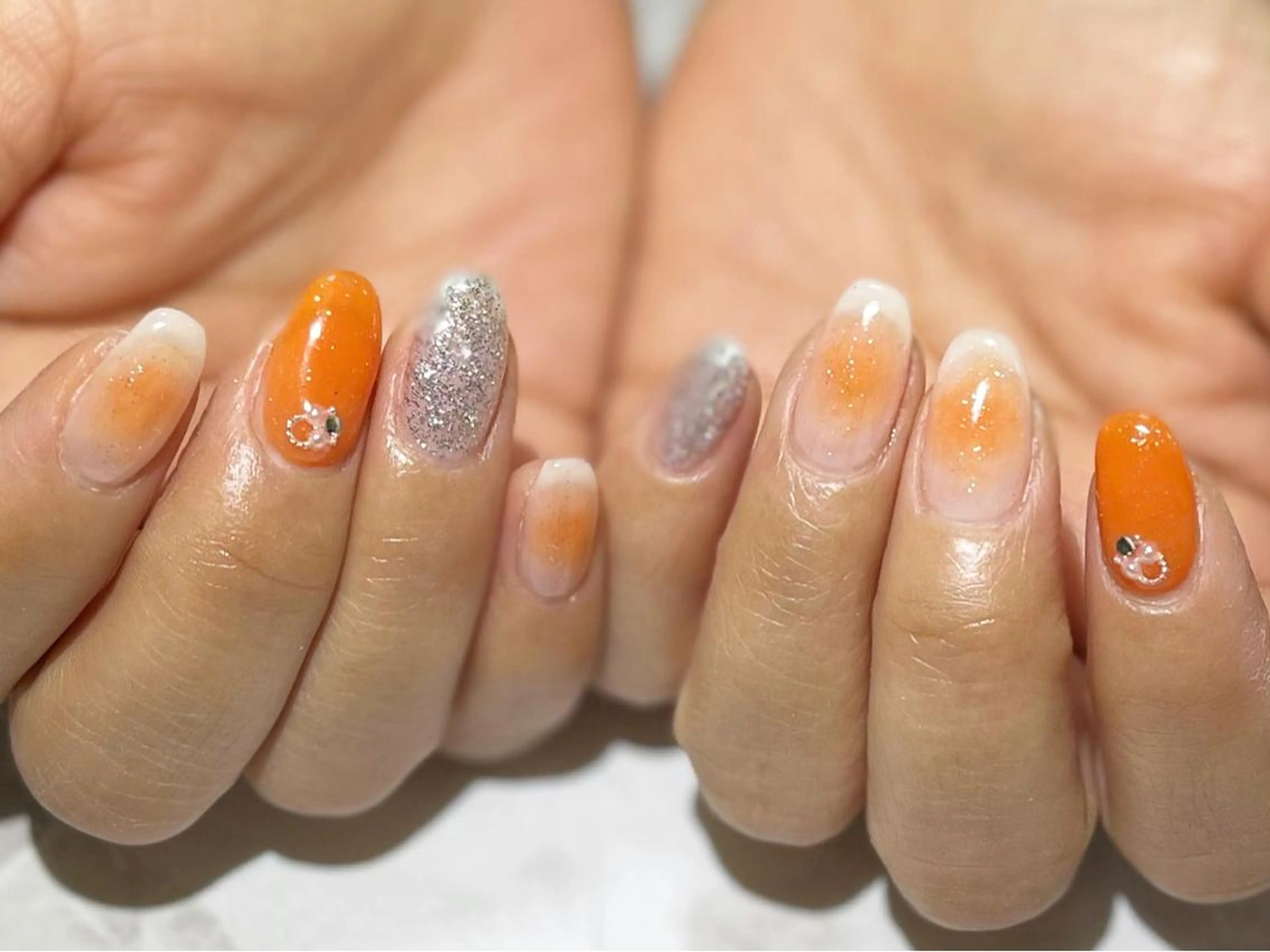 ネイル チークネイル フットネイル ニュアンスネイル オレンジ シンプルネイル ネイル フフラ所属・nail fufla ♡yamane♡のネイルデザイン