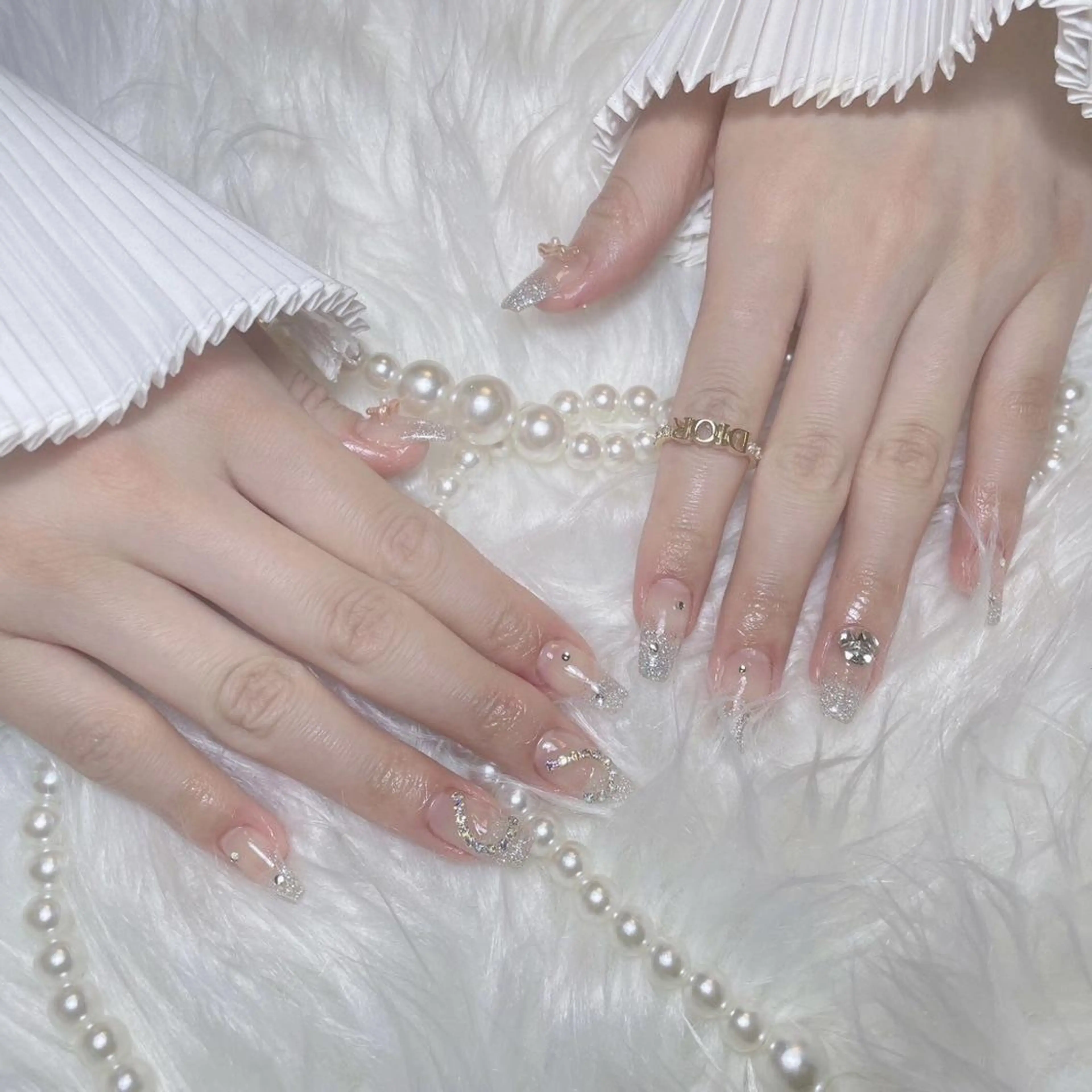 ネイル RAFFINE 月🦋🩵のネイルデザイン