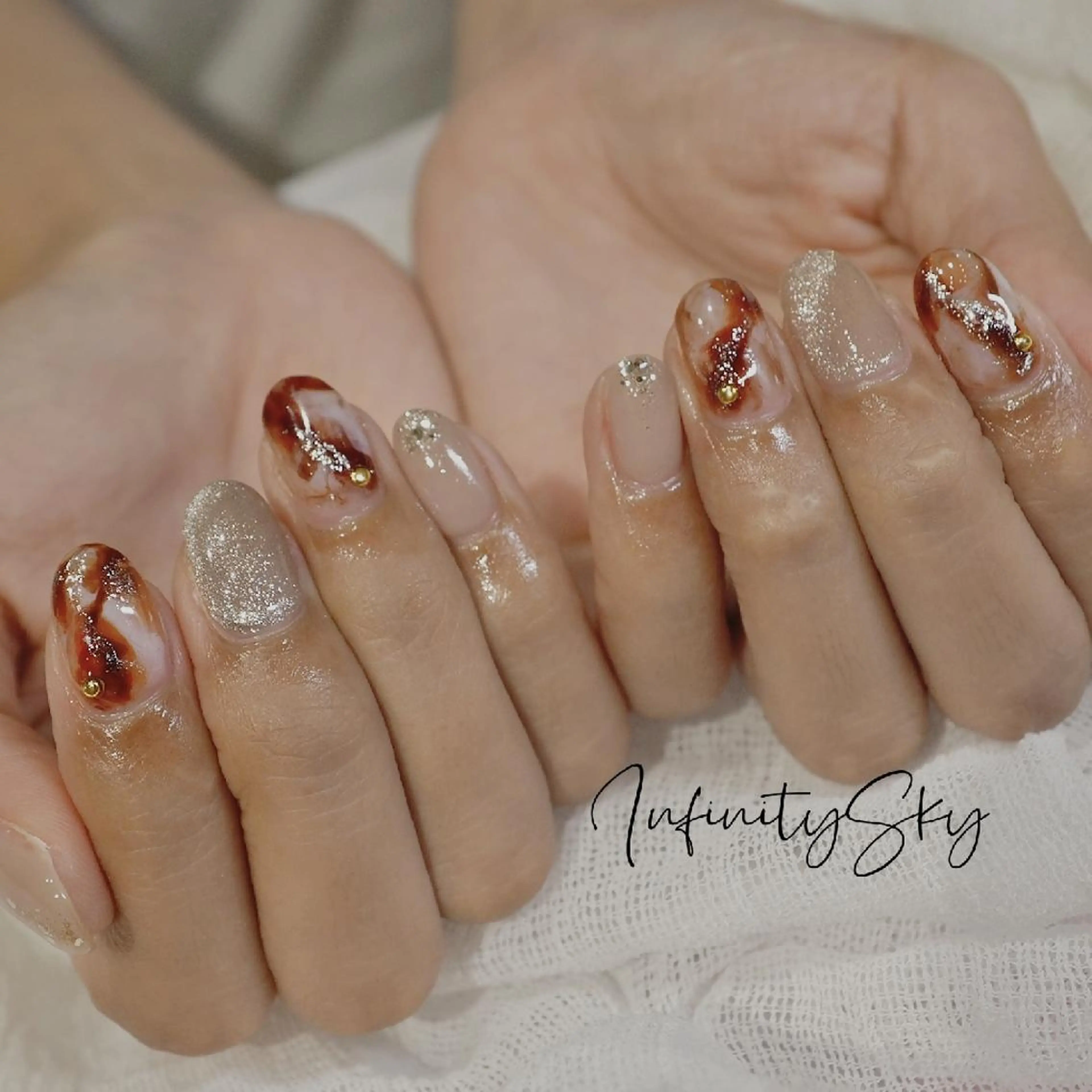 ネイル ブラウン ハンドネイル infinity skyのネイルデザイン