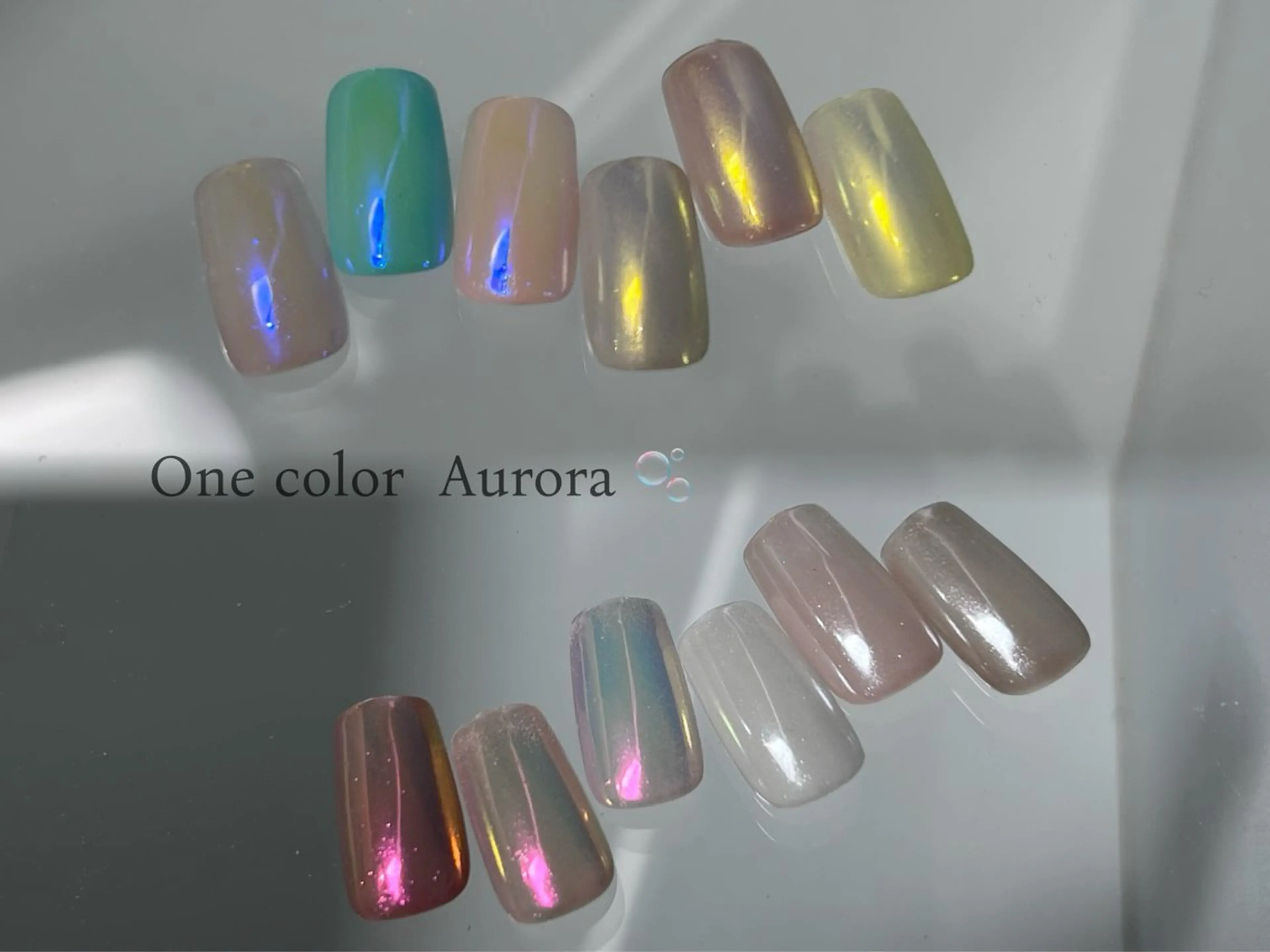 ネイル オーロラネイル ブルー ミラーネイル ワンカラーネイル ピンク ハンドネイル Mermaid Nailのネイルデザイン