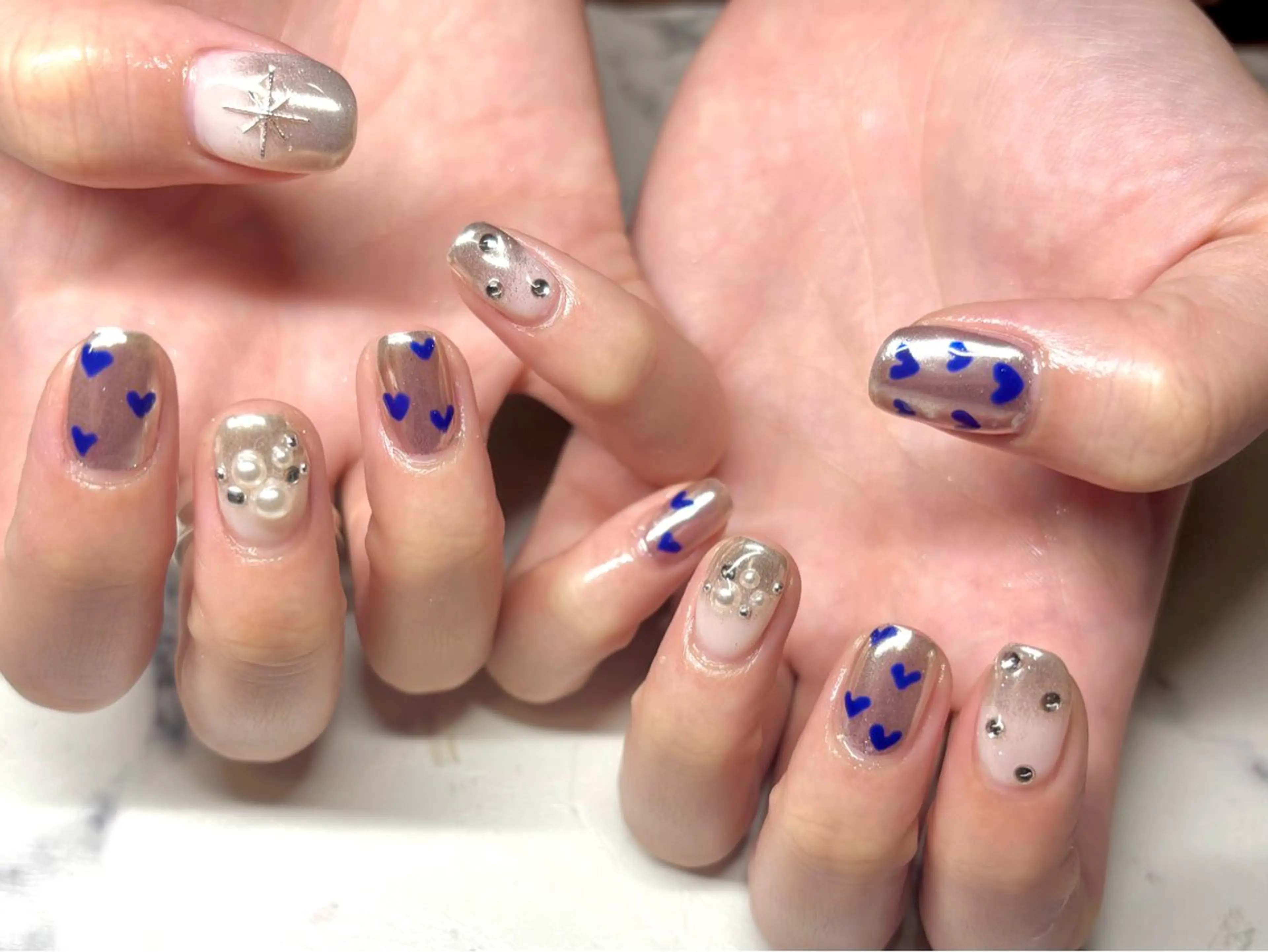 ネイル ジェルネイル ハート キラキラネイル 韓国ネイル ミラーネイル mimimi nail所属・I. MITSUKIのネイルデザイン