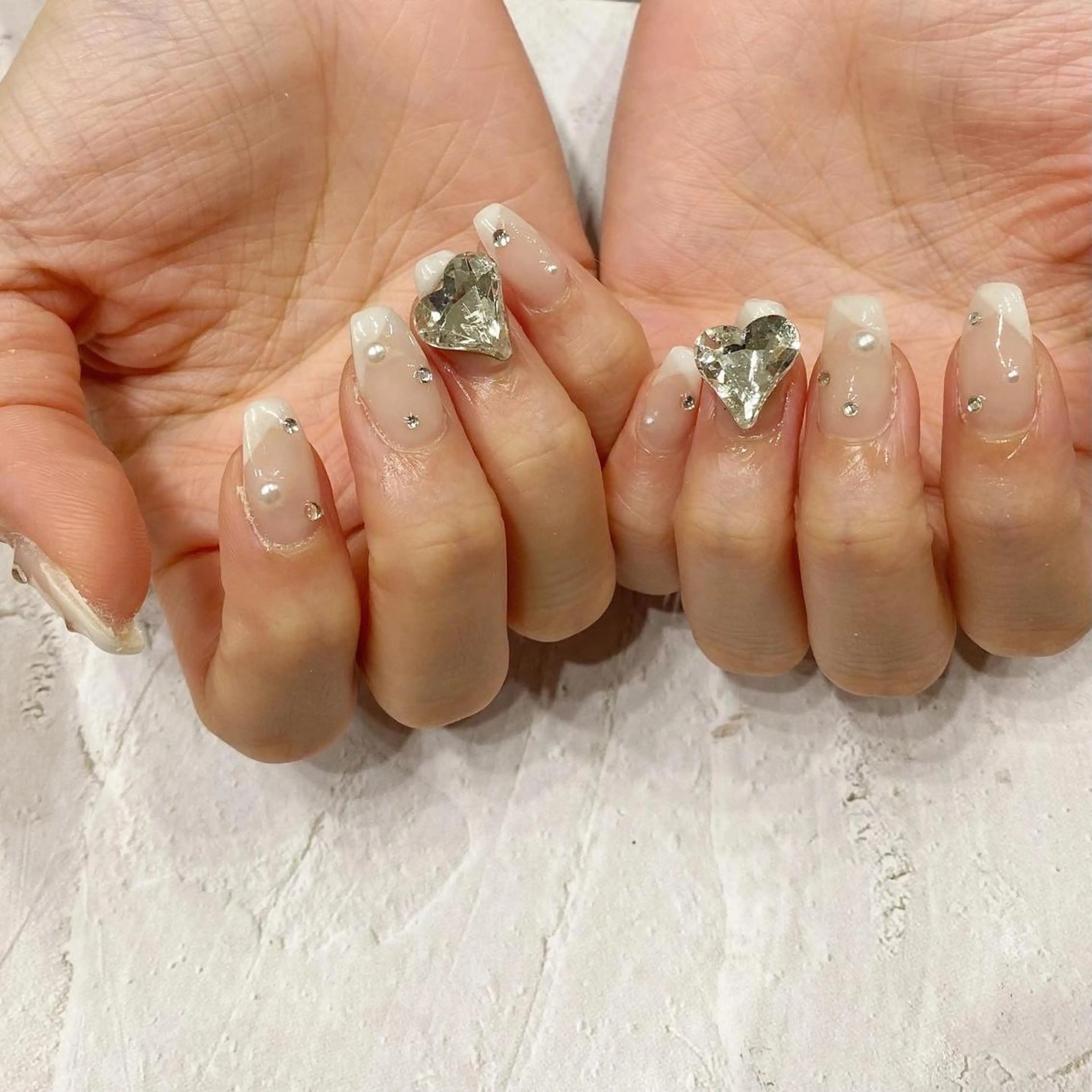 ネイル フレンチネイル ハート 韓国ネイル ワンホンネイル ハンドネイル melu所属・melu yukikoのネイルデザイン