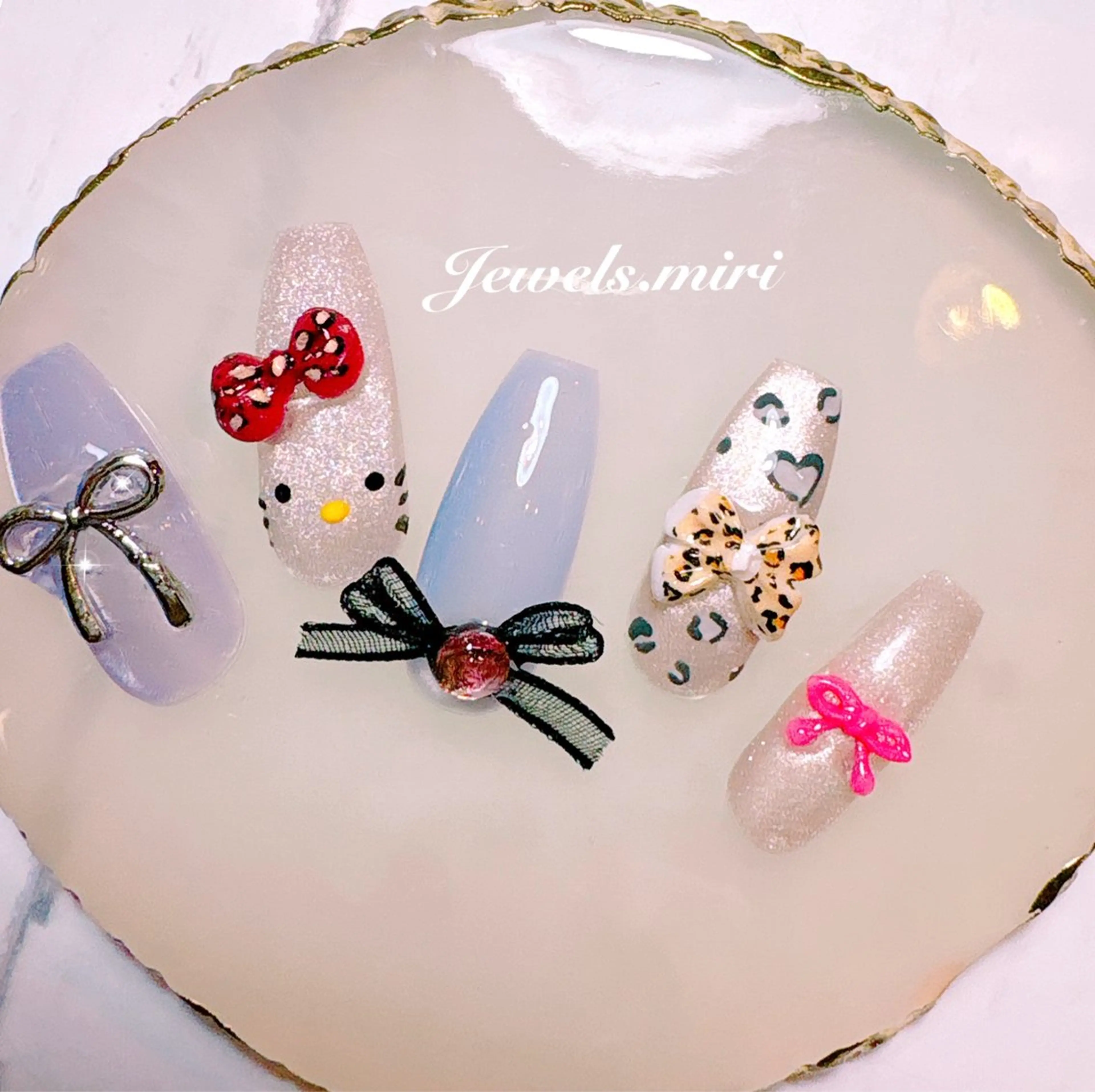 ネイル リボン Jewels nail lily 白楽所属・ネイルサロン Jewels Mのネイルデザイン
