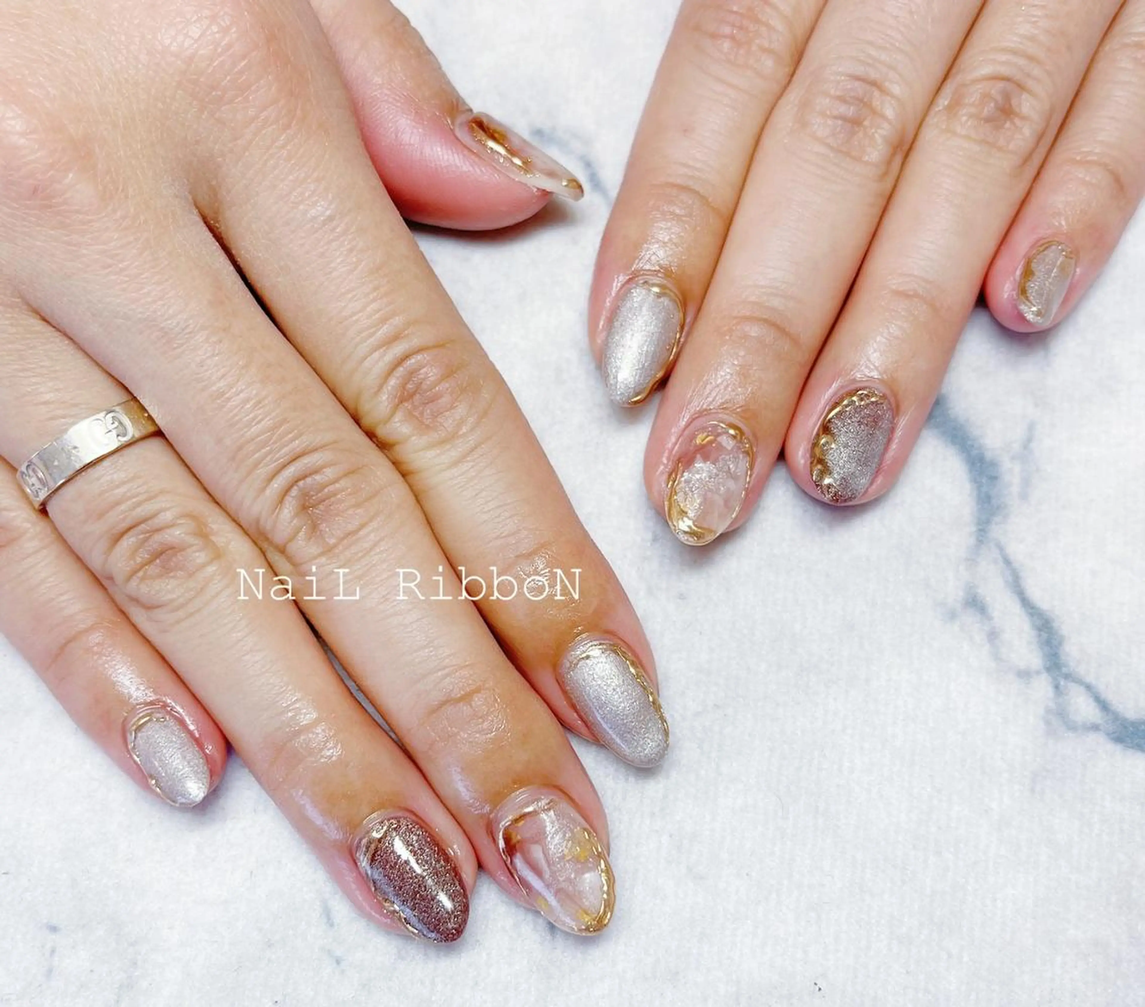 ネイル ネイルリボン 受付スタッフのネイルデザイン