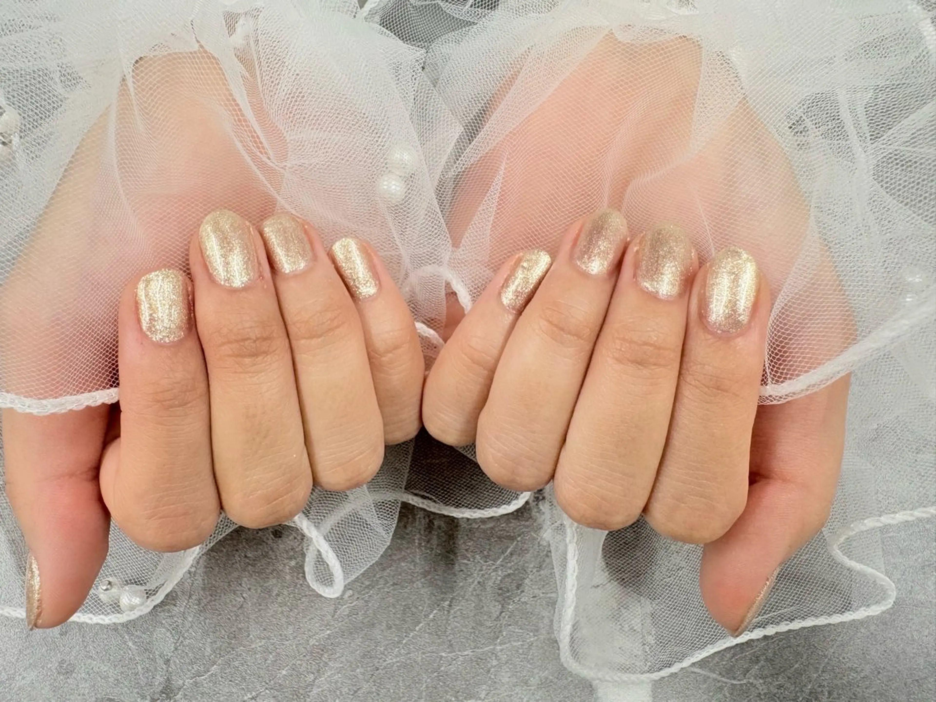 ネイル ゴールド キラキラネイル Bijou nail salon所属・Ｂijou chihiroのネイルデザイン
