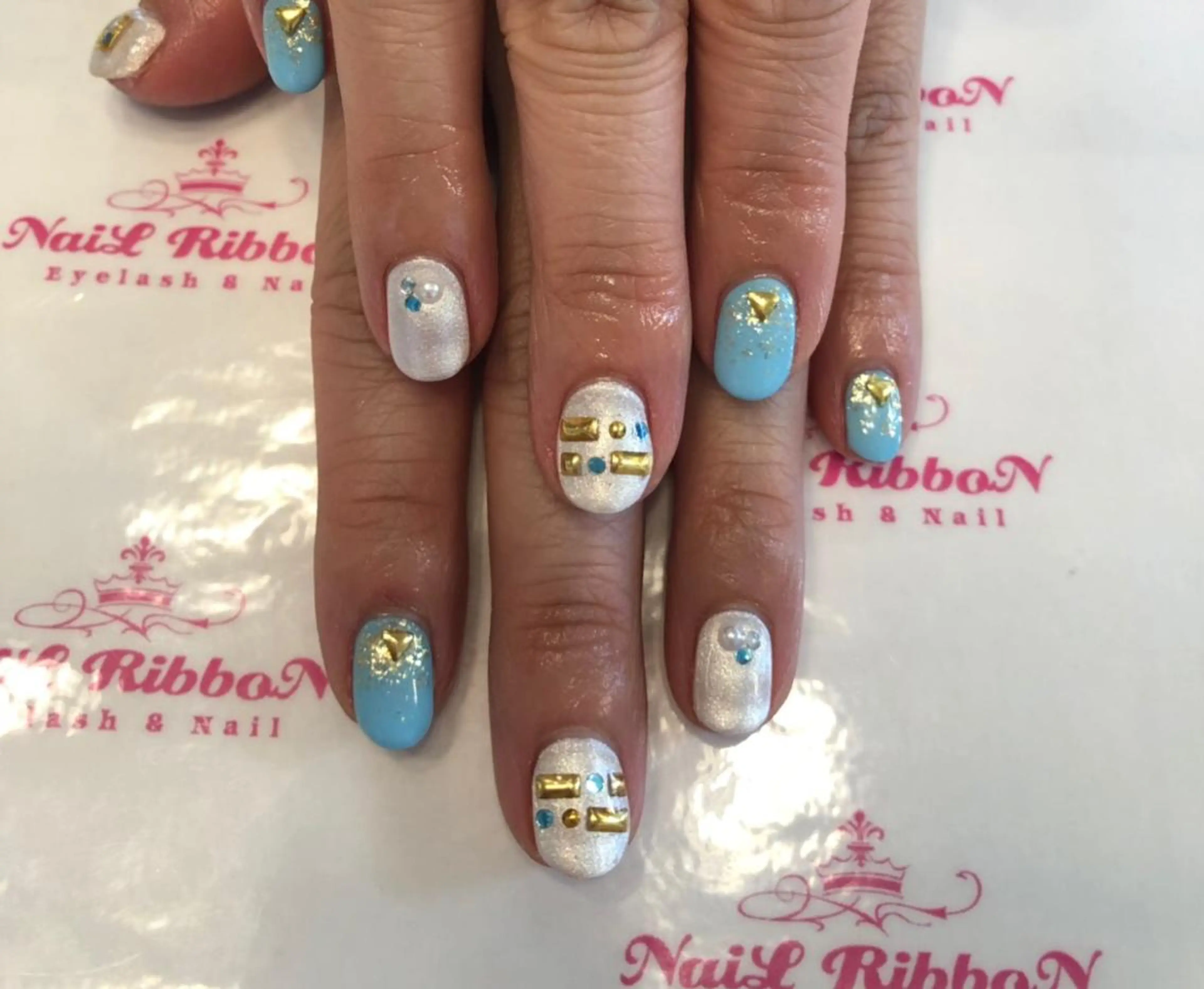 ネイル 春ネイル ネイルリボン 受付スタッフのネイルデザイン