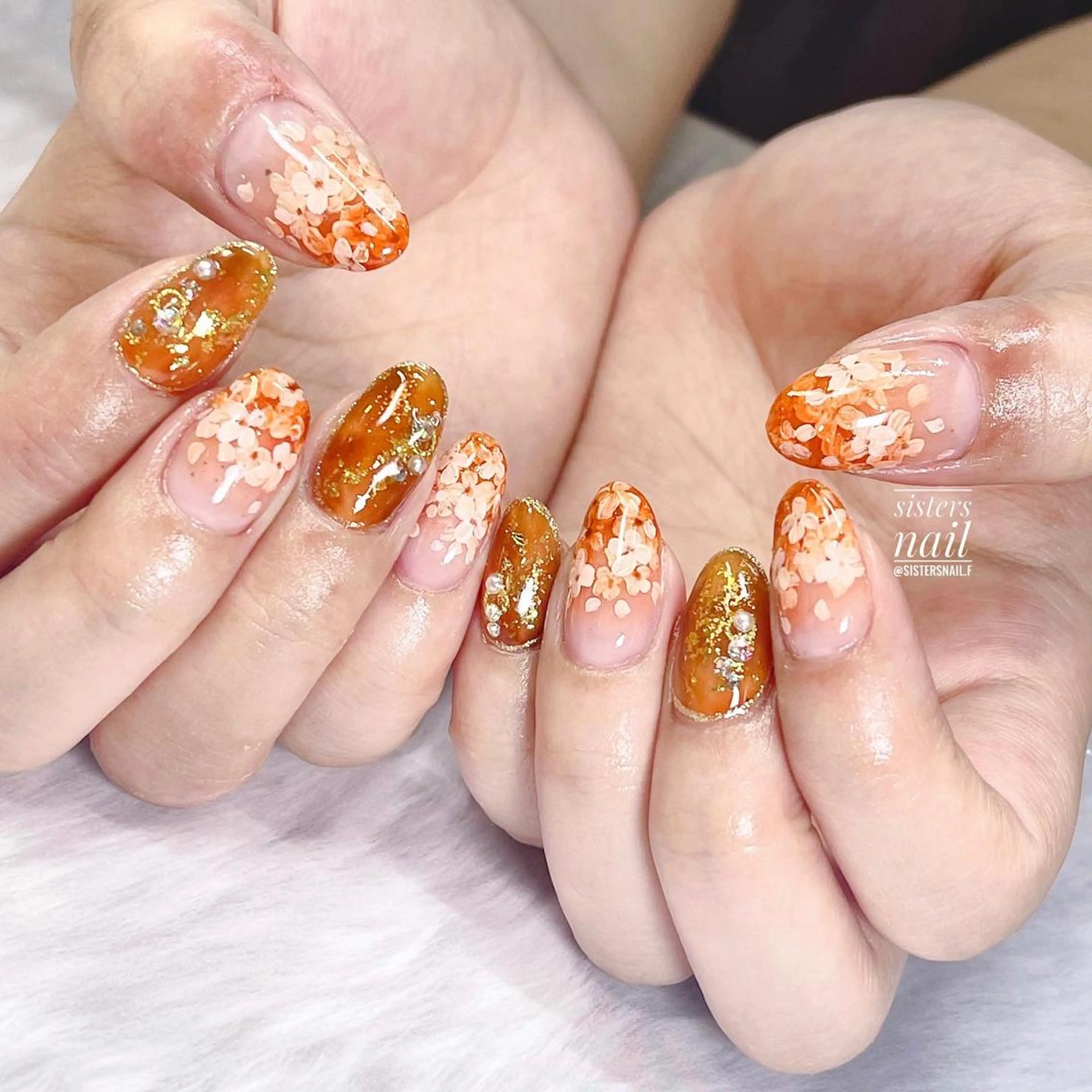 ネイル アートネイル べっ甲ネイル フラワーネイル オレンジ sisters nail.fのネイルデザイン