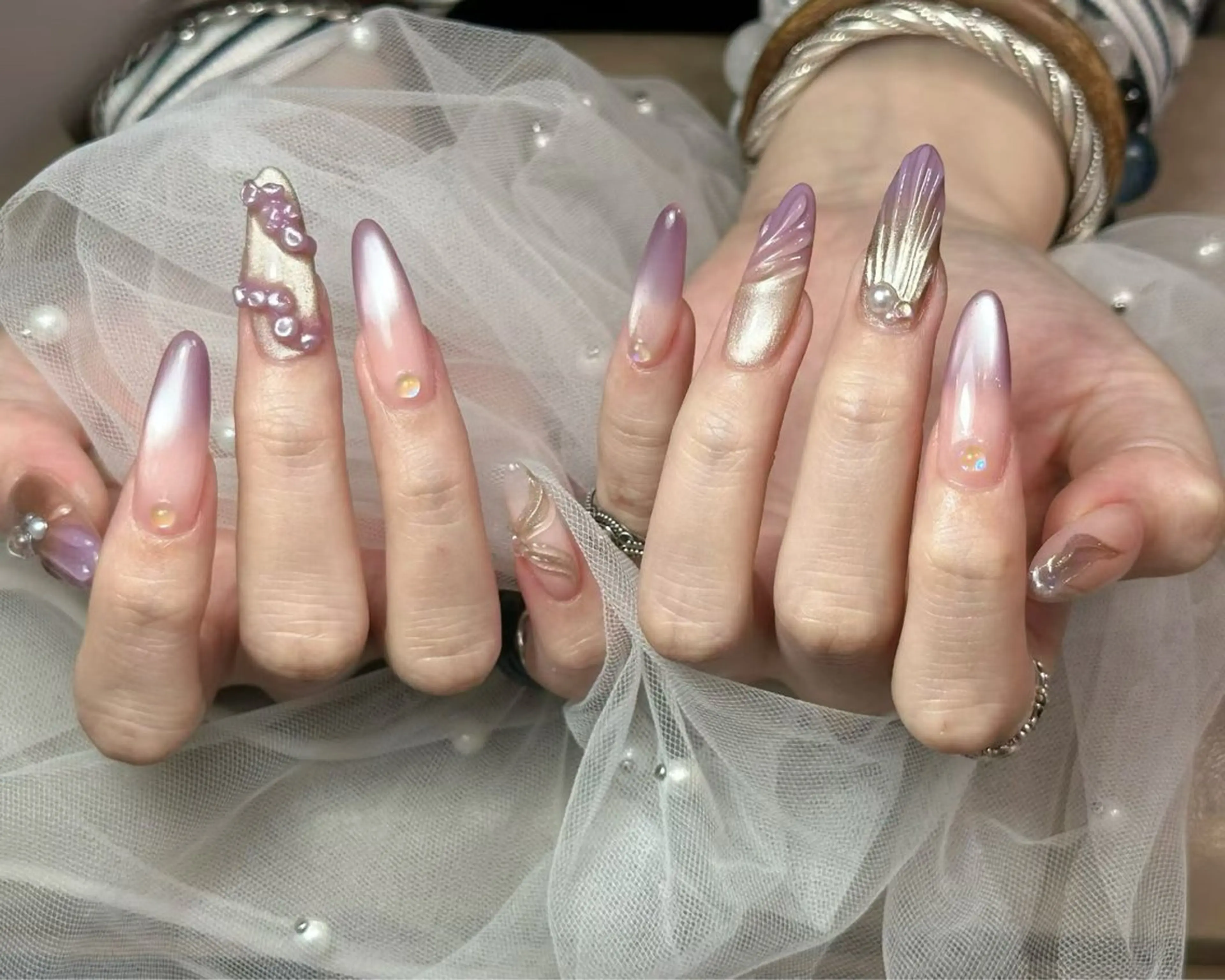 ロング ハンドネイル ハンドケア 一其 サロンのネイルデザイン