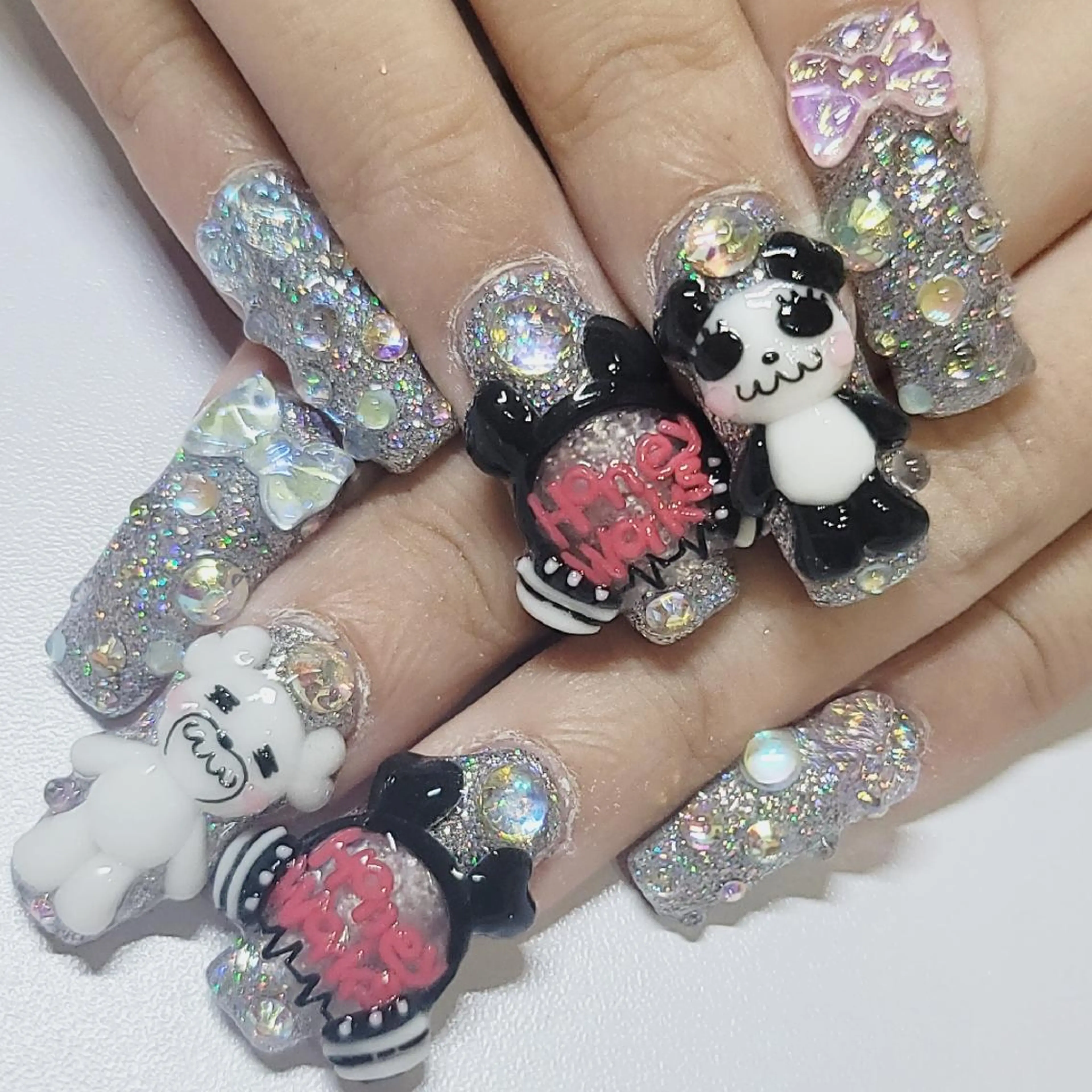 ネイル アートネイル オーロラネイル ラメ(グリッター) ワンカラーネイル シルバー ハンドネイル よしだ ひろきのネイルデザイン