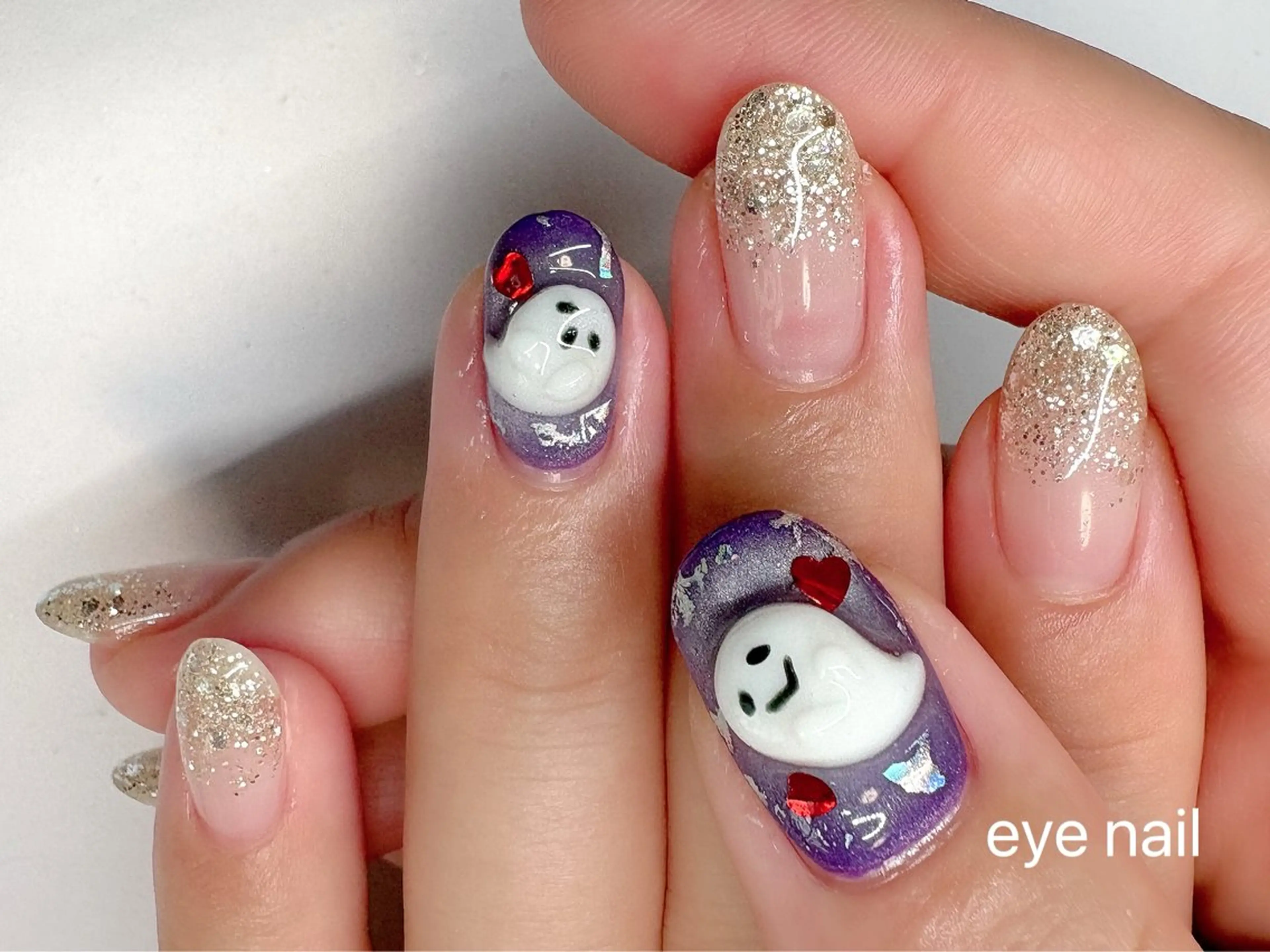 ネイル ジェルネイル グラデーション ハロウィン ラメ(グリッター) ラメグラデーション ハンドネイル Eye nailのネイルデザイン