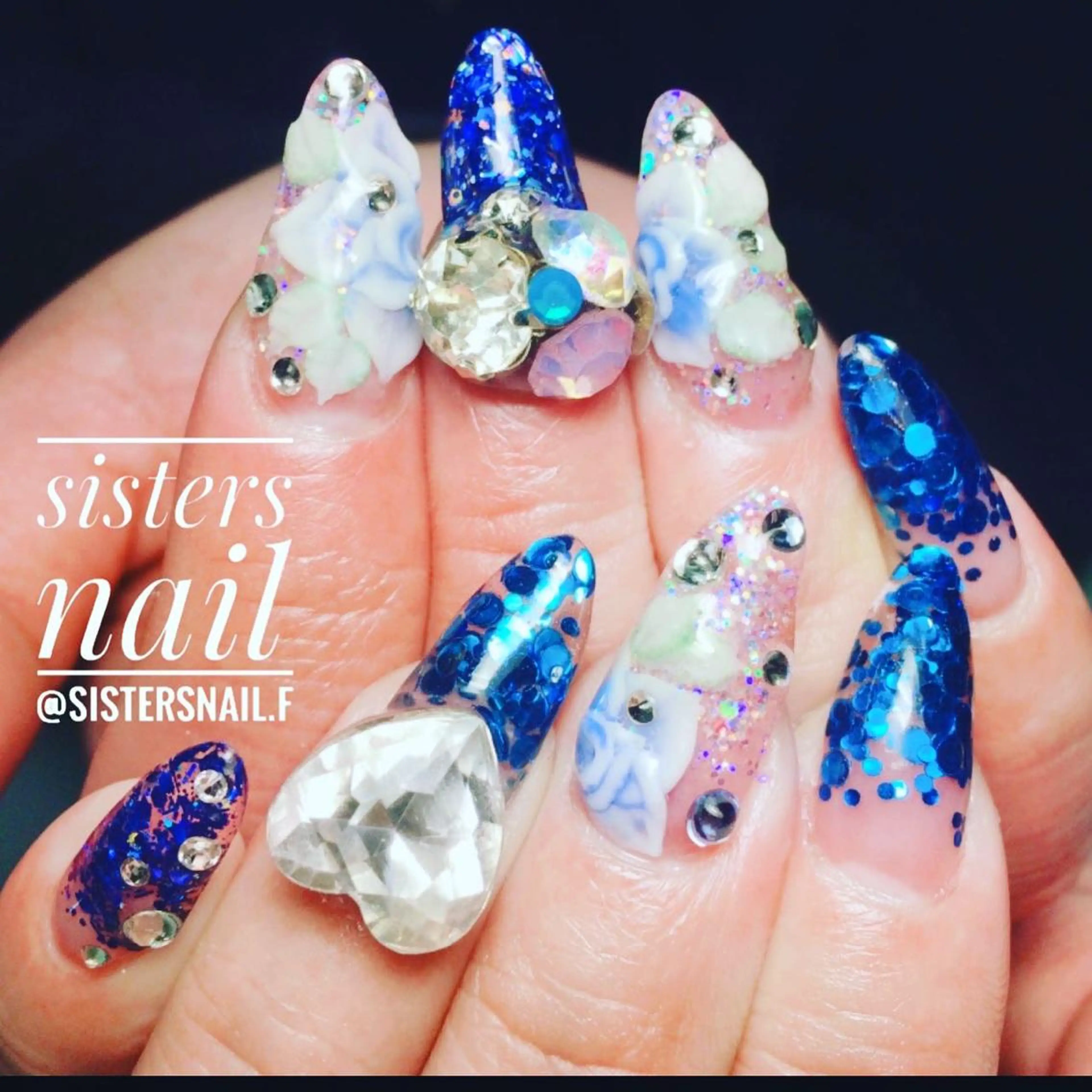 ネイル アートネイル ブルー クリアネイル 成人式 フラワーネイル sisters nail.fのネイルデザイン